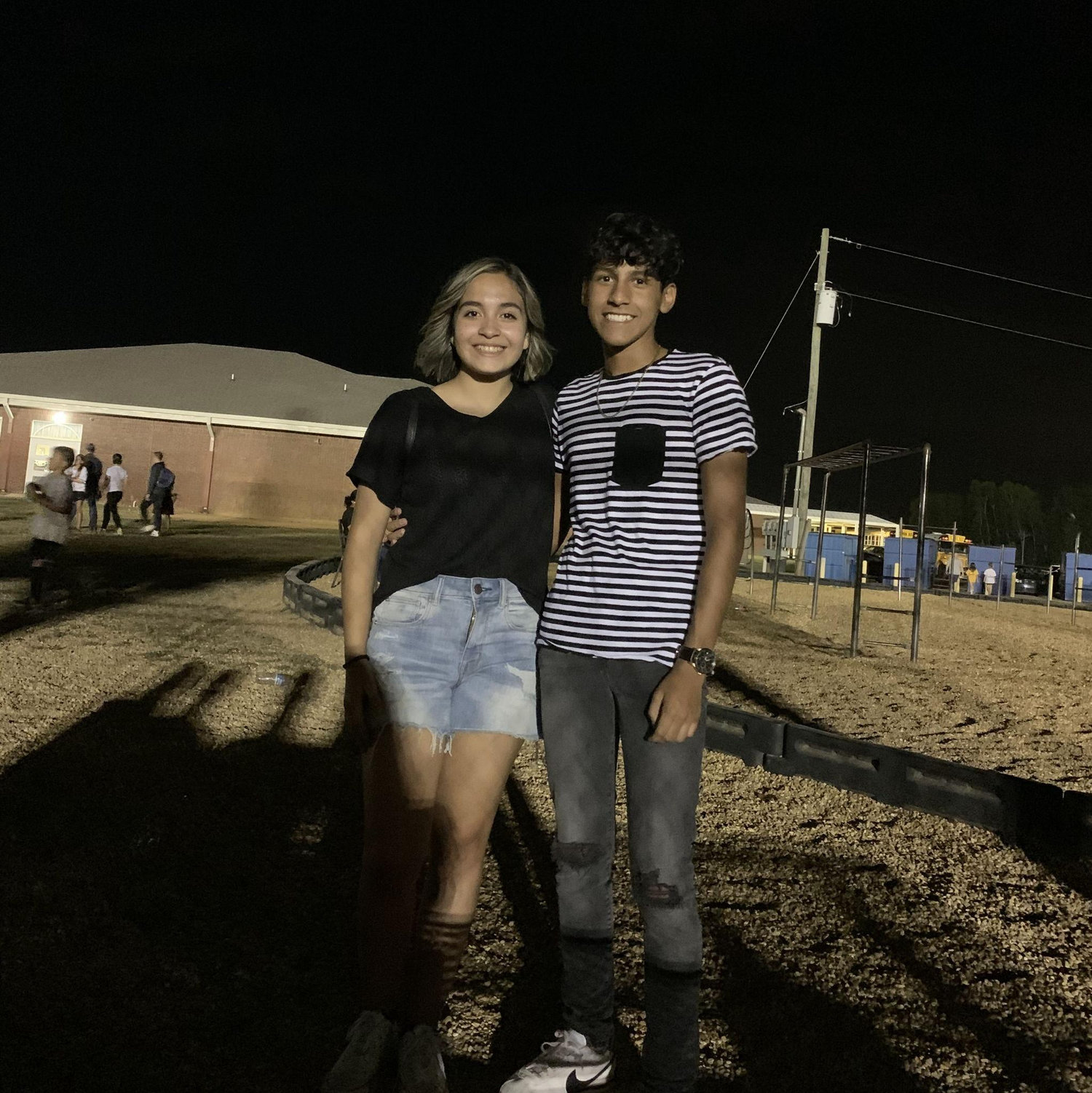 Spending time together at a football game during 8th grade!