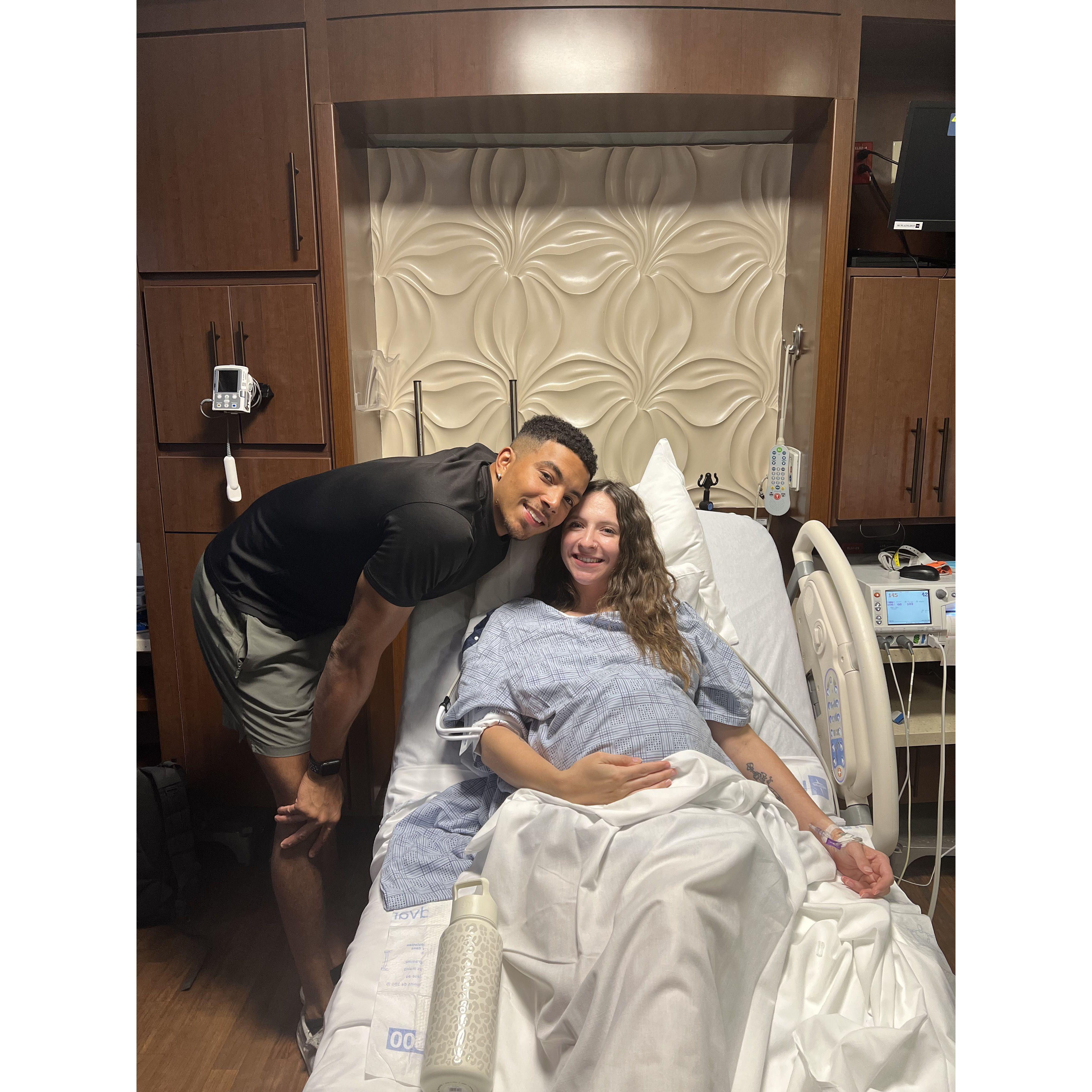 Us in the hospital before our girl made her entrance