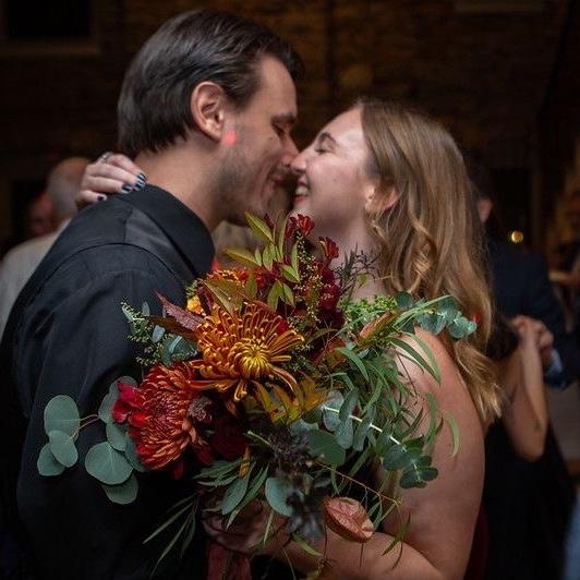 While celebrating a Boom wedding, Miranda caught the bouquet— guess what they say about catching the bouquet is true, because they were the next ones engaged in the family!
