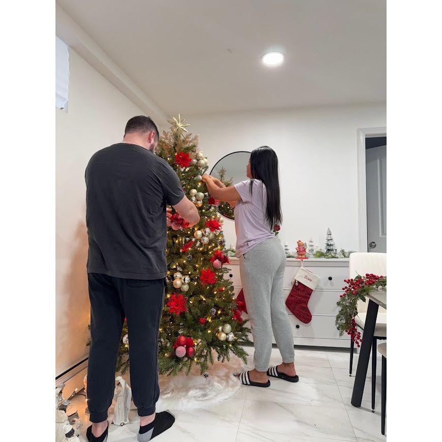 Decorating for Christmas in our apartment.