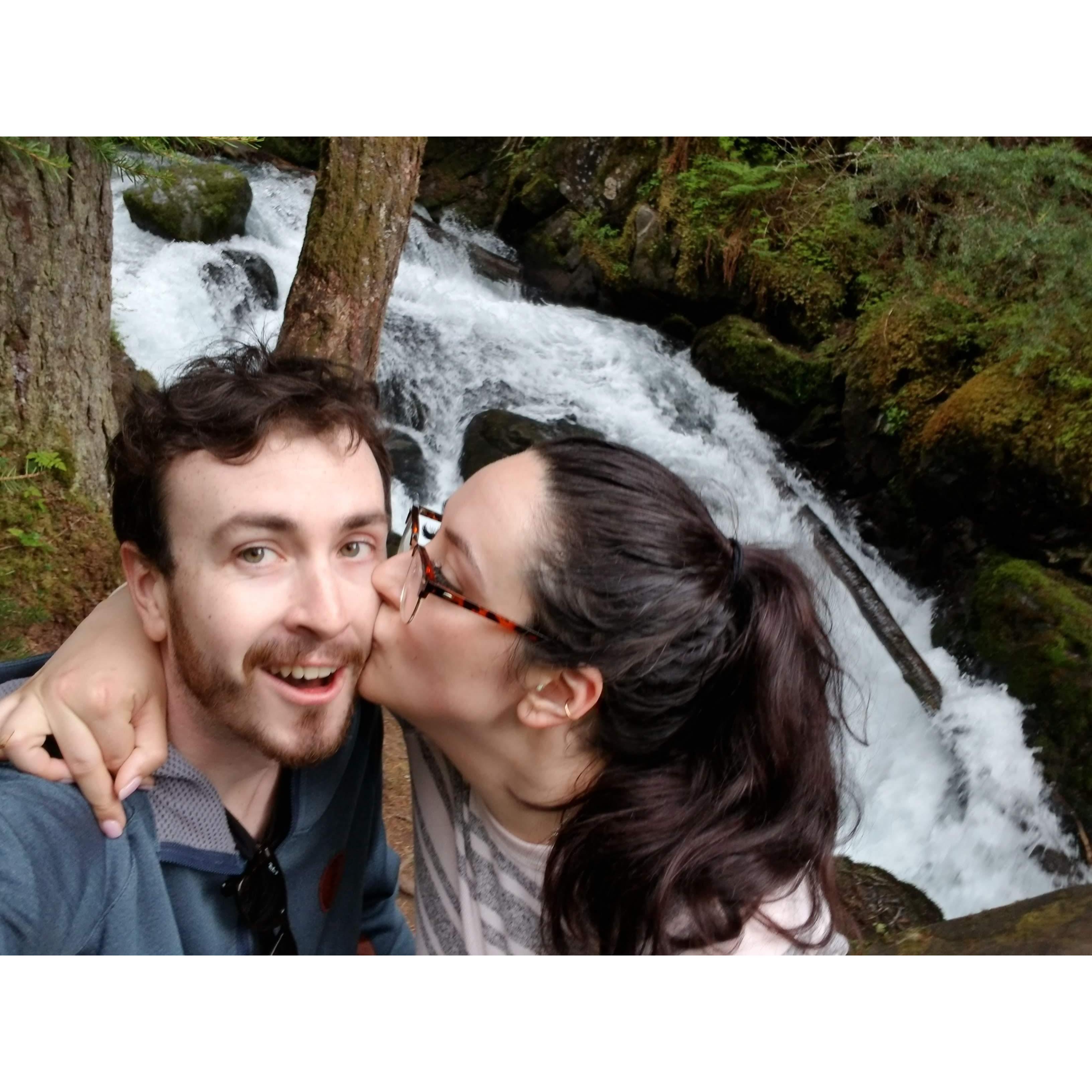 Enjoying a hike in the backyard of the Airbnb in Alaska.