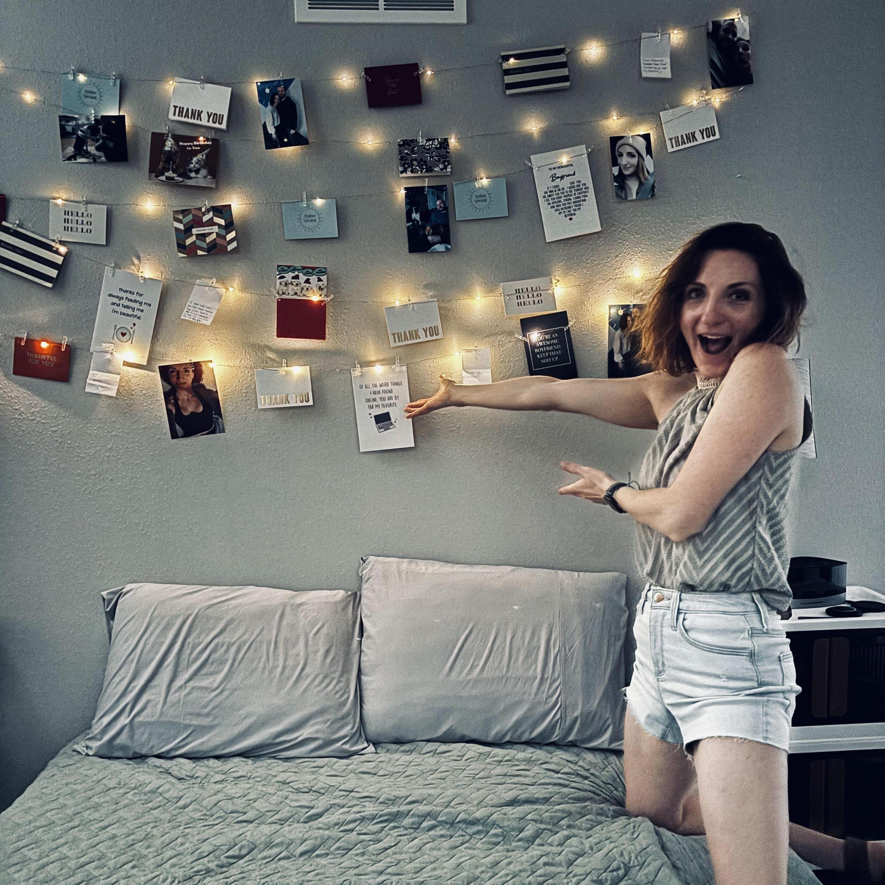 Roy surprises Ä with a photo wall, at his apartment, of Roy + Ändrea. June 2024.