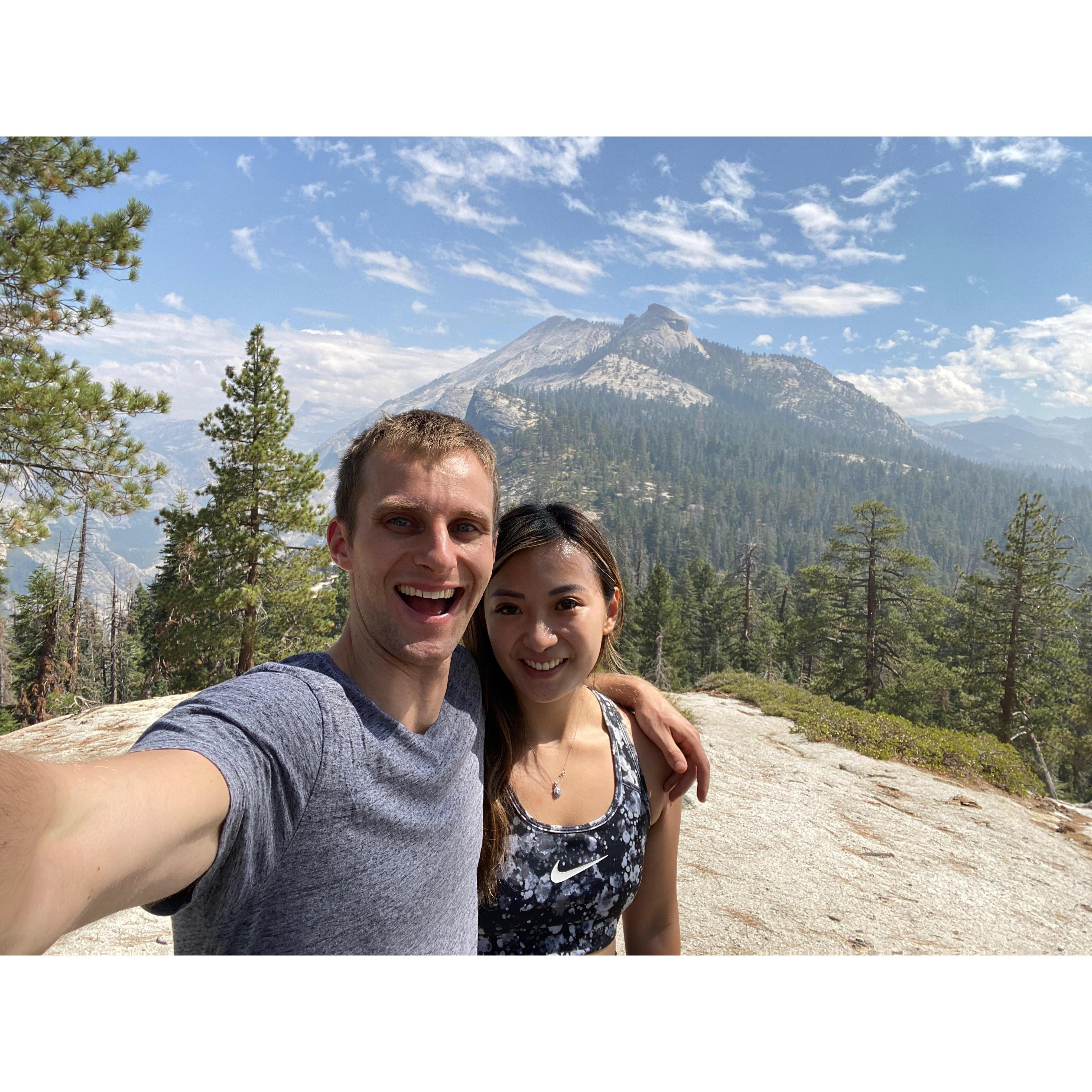 Pushing each other to climb up to the top of Half Dome in Yosemite.