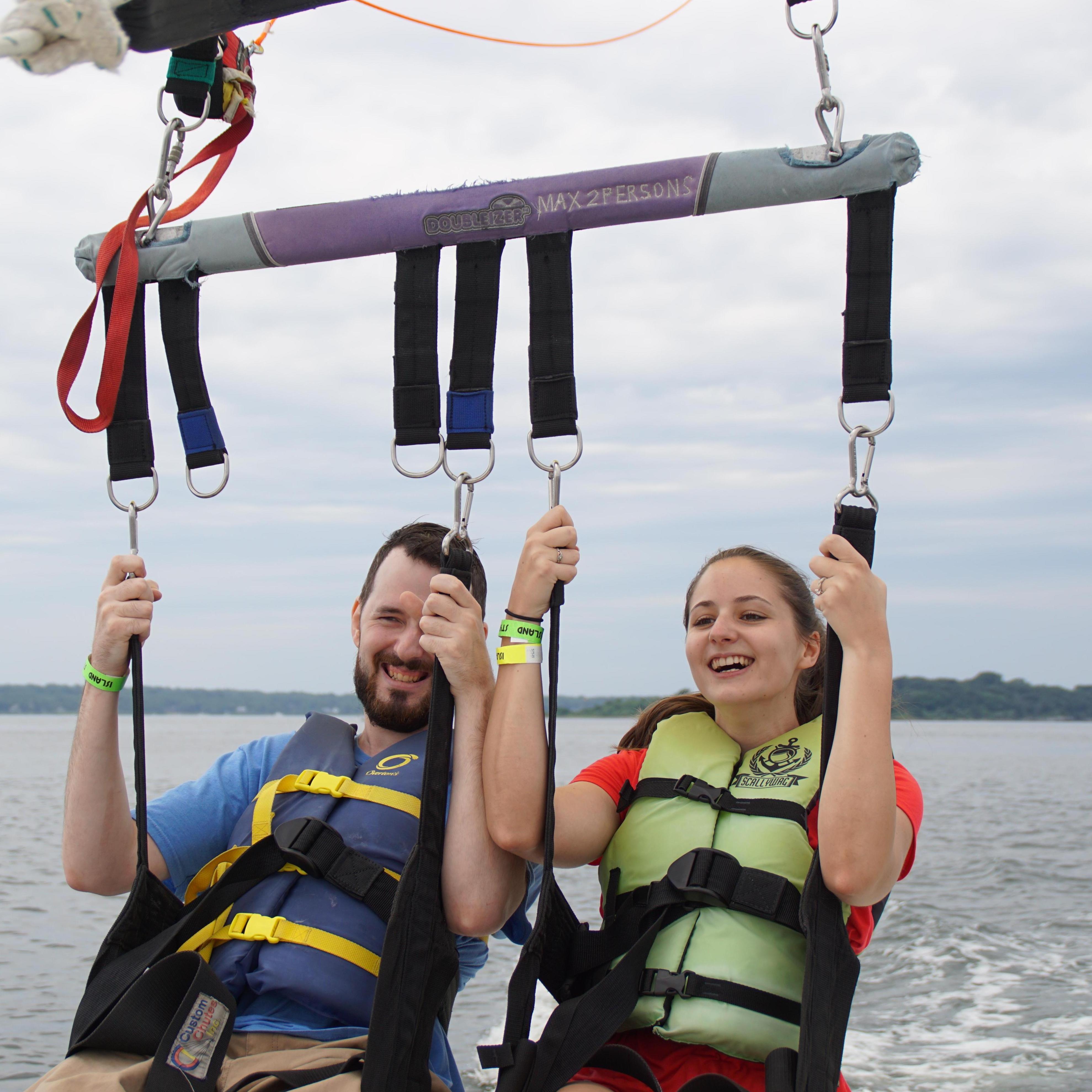 That time Chris surprised Kaleigh with a parasail ride because he knew it was on her bucket list
