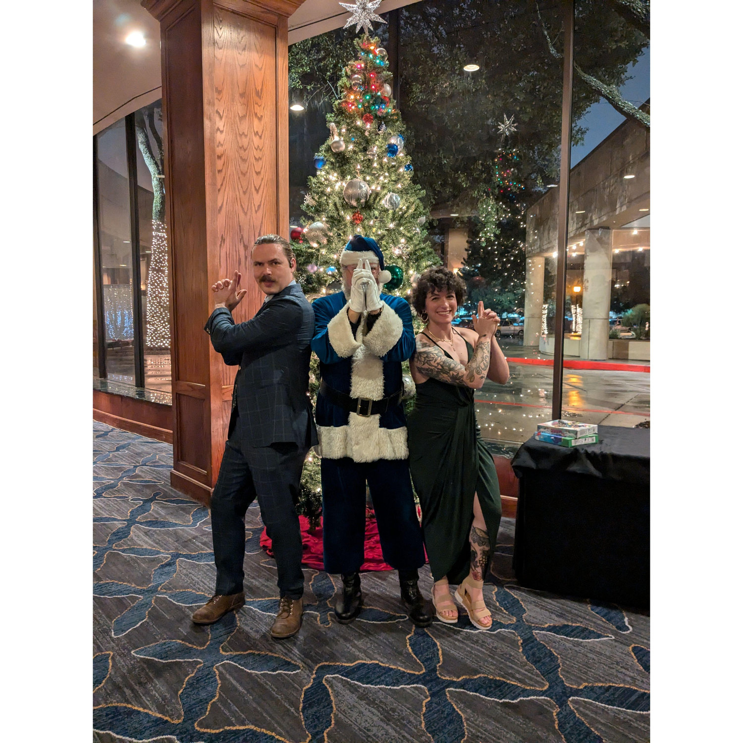 Our first Christmas work party together. Sean's first time in Jessie's Charlie's Angels with Santa tradition.