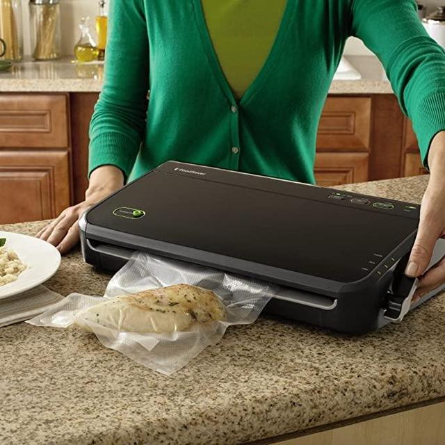 FoodSaver FM2100-000 Vacuum Sealer Machine System with Starter Bags & Rolls | Safety Certified