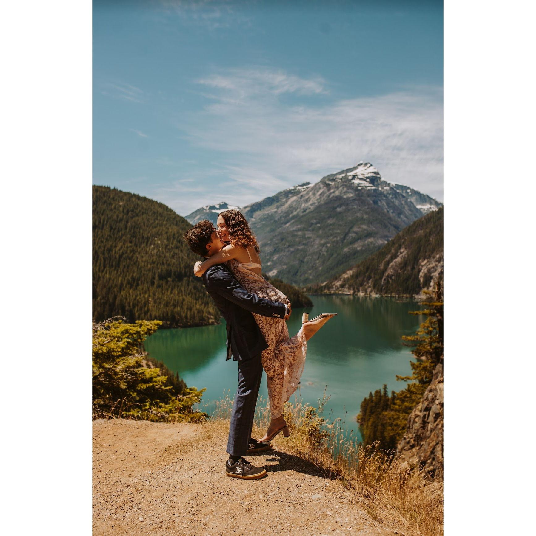 From personal experience, we can now recommend jumping into your partner's arms at gorgeous lakes for photo shoots.  This was taken at one of our favorite trips ever.