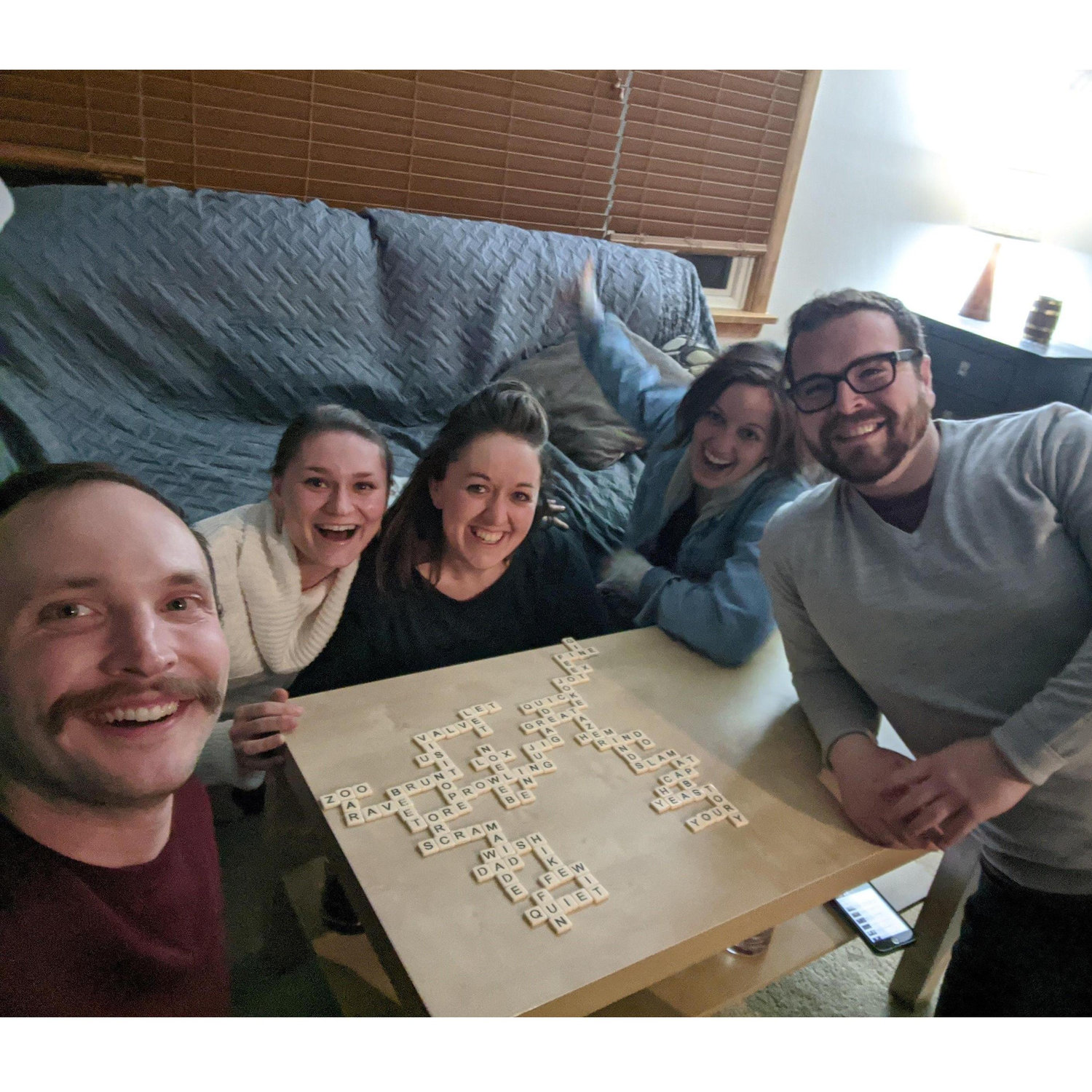 Team scrabble. Rule: share something you love before you add a word to the board.