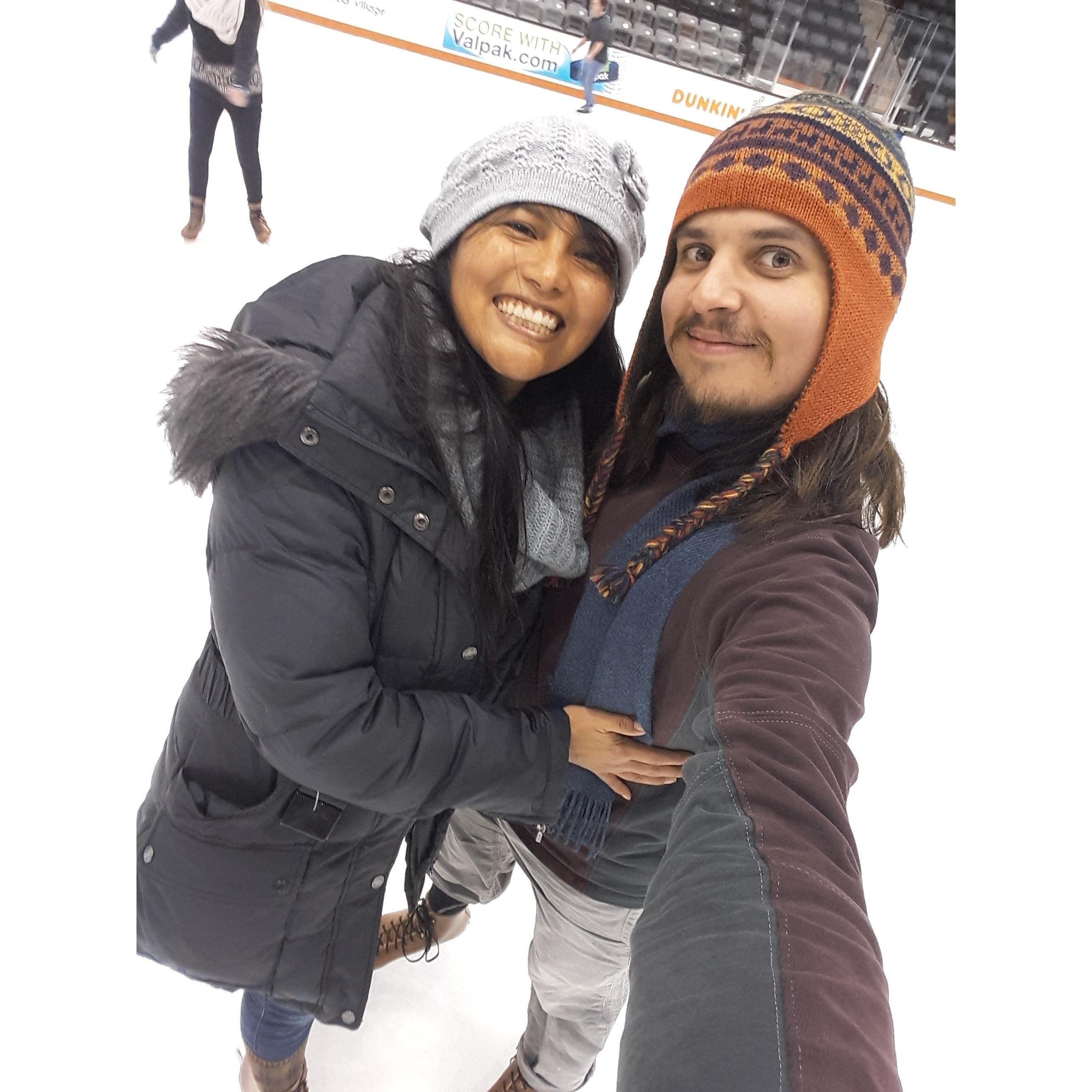 Ice skating, Lourdes holding onto Brendan at RIT