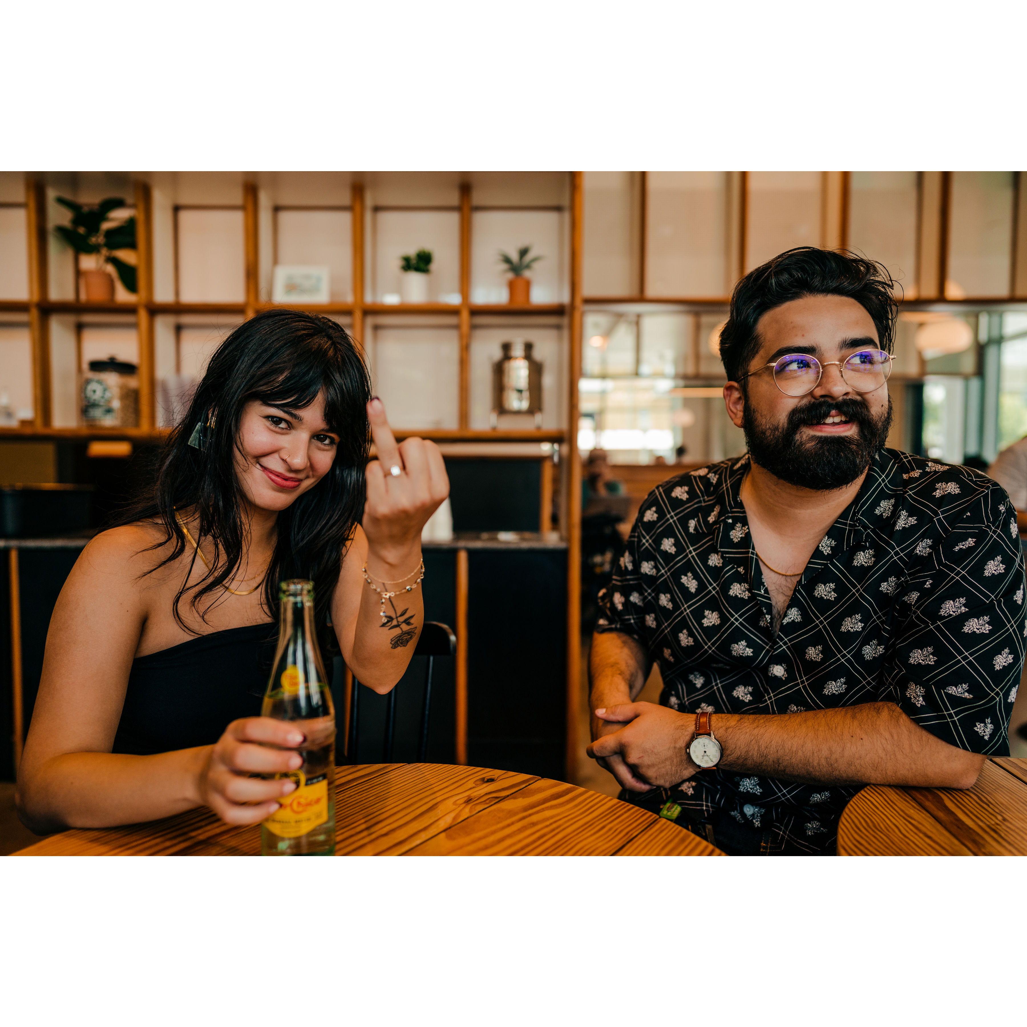 Destiny and Kieran celebrating their engagement at a nearby coffee shop.
