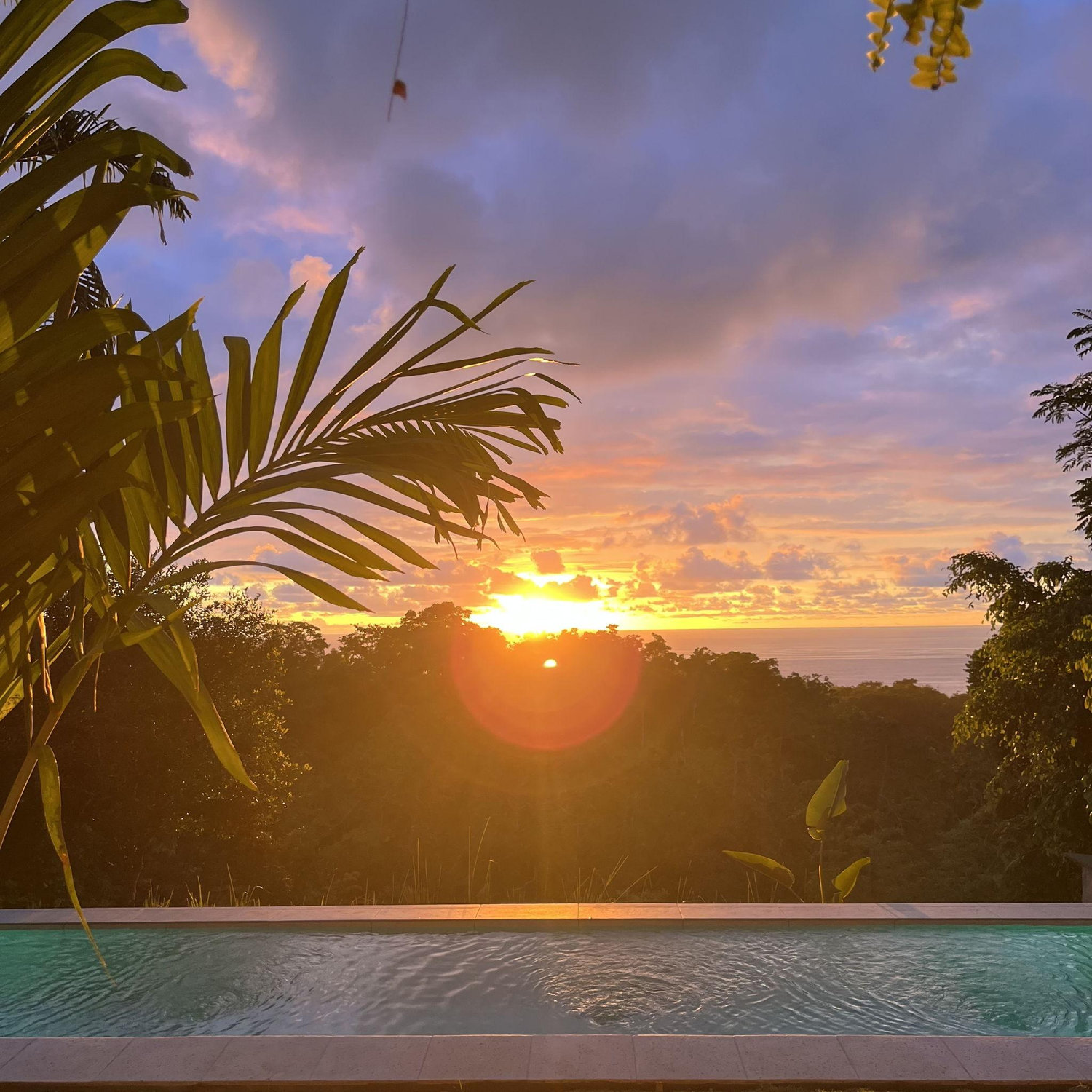 The infinity pool at sunset at Cinco Cerros