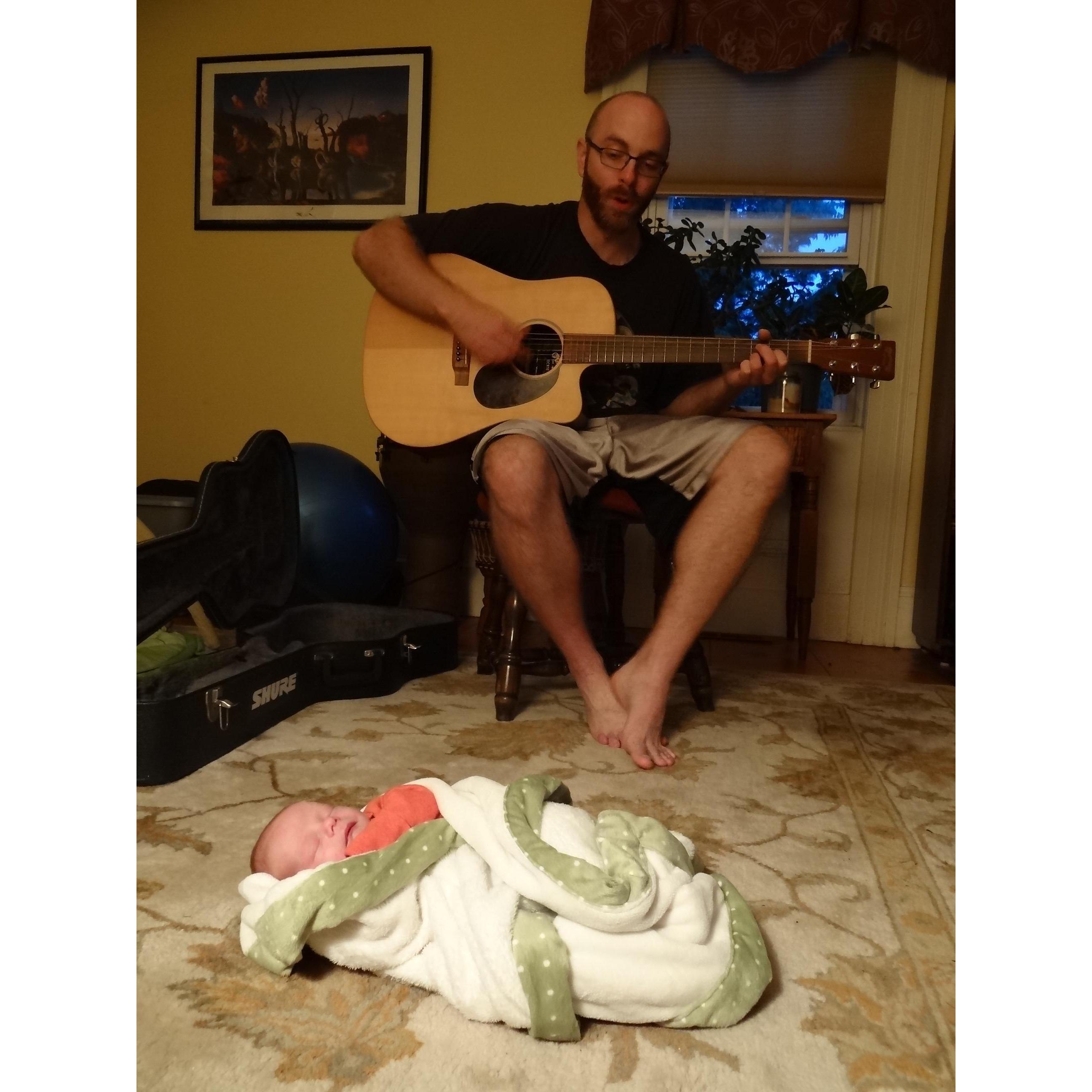 My man, playing music for my baby, melts my heart then, melts my heart still. When Keegan is playing guitar and singing, its as if the world is how its meant to be. <3