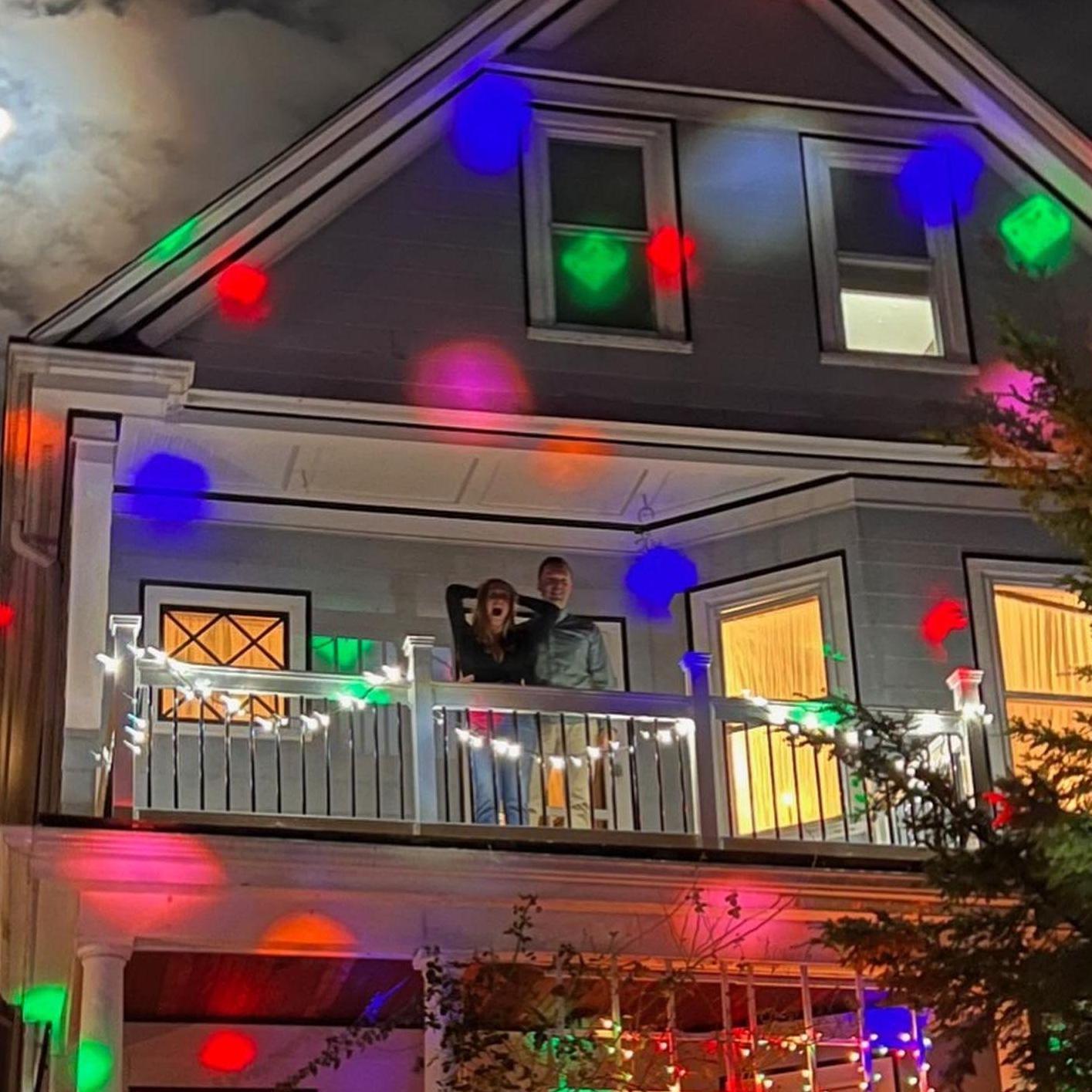 Friends and family surprised Elis outside our apartment after she said yes!