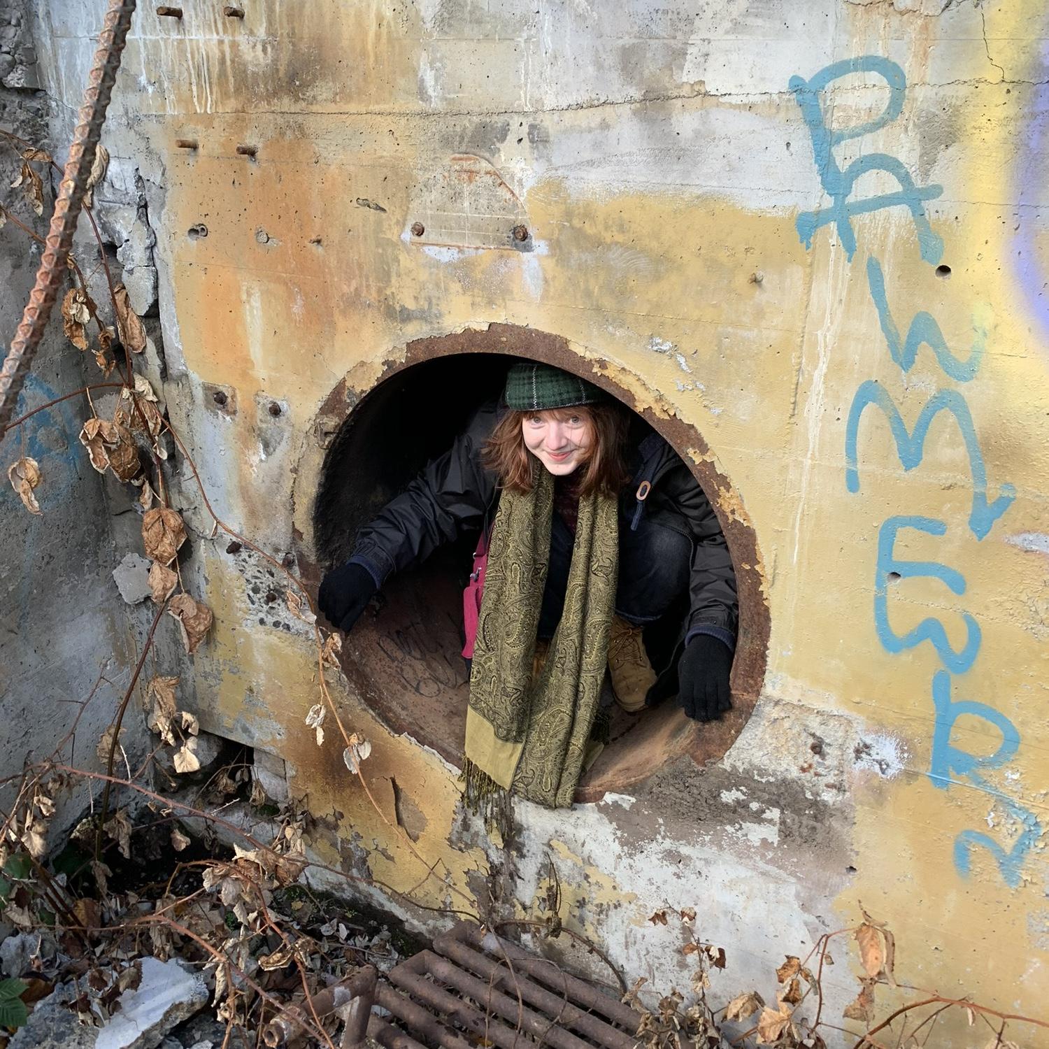 Rooting around the sewer for treats.