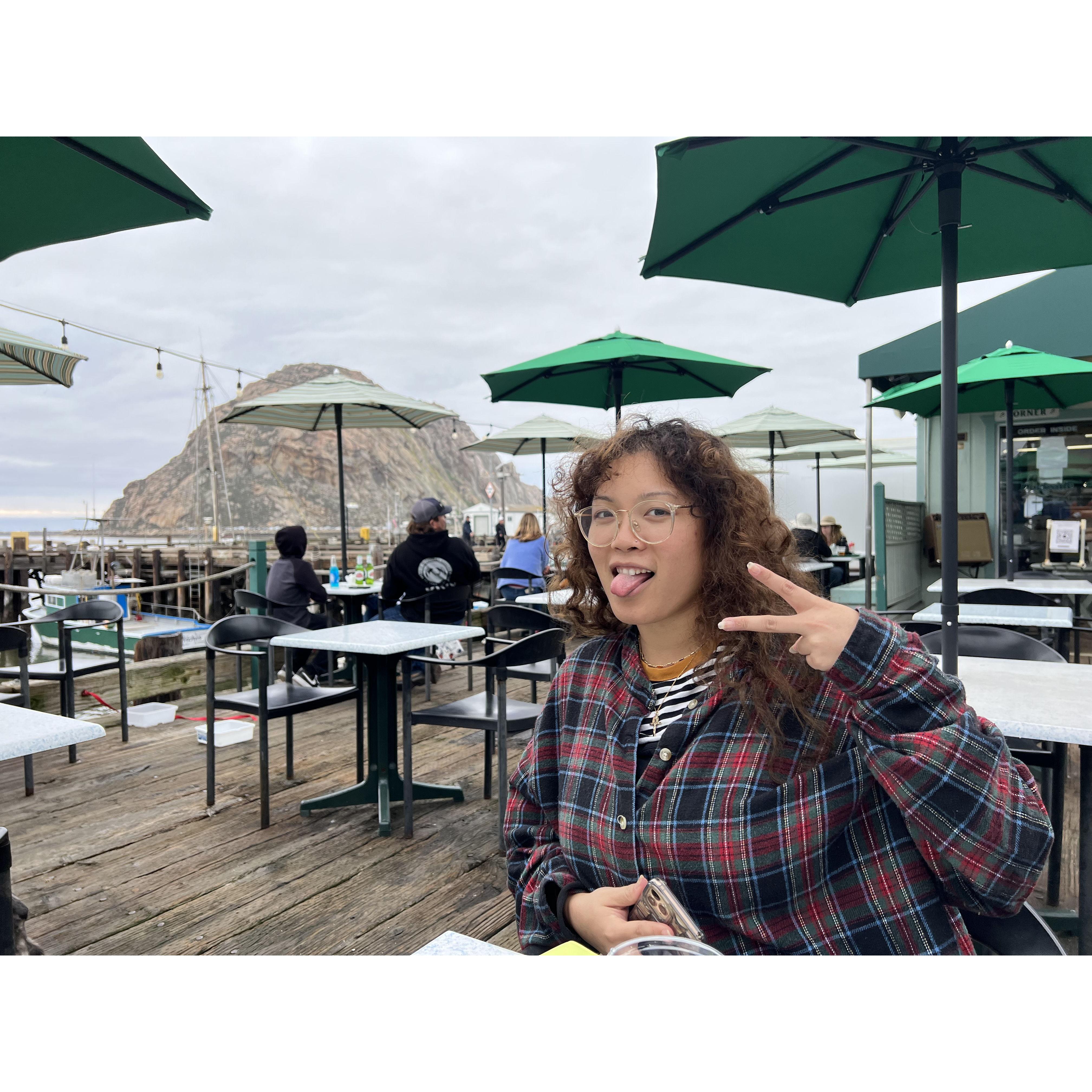 Ariana introducing Daniel to BBQ Oysters in Morro Bay.
