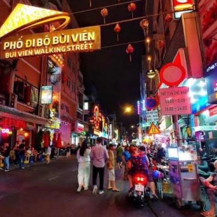 Saigon After Dark by Vespa