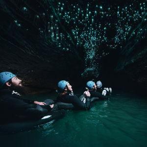 Rafting through the Glow Worm Caves in New Zealand