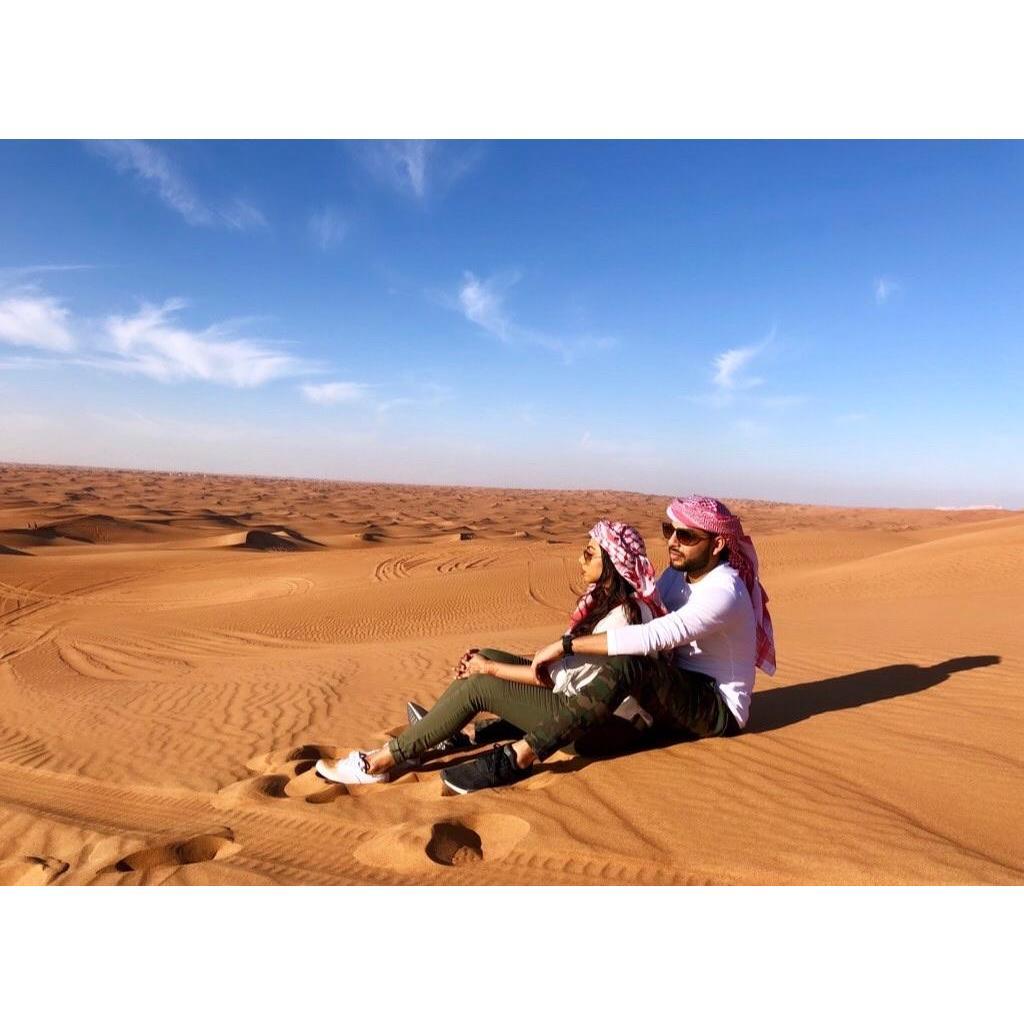 Posing like our parents would, but loving the Arabian Desert nonetheless.