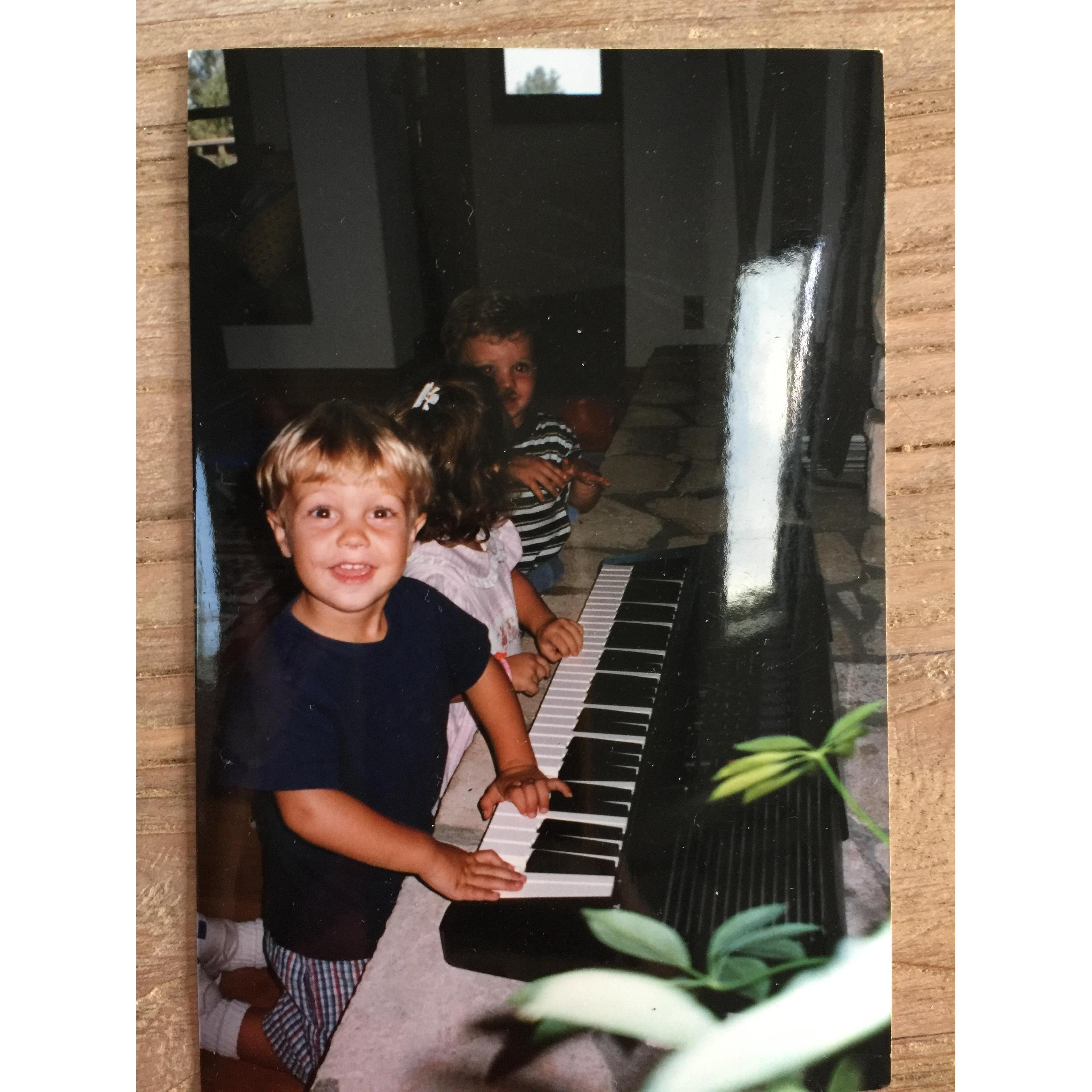 Young Mitchell playing piano