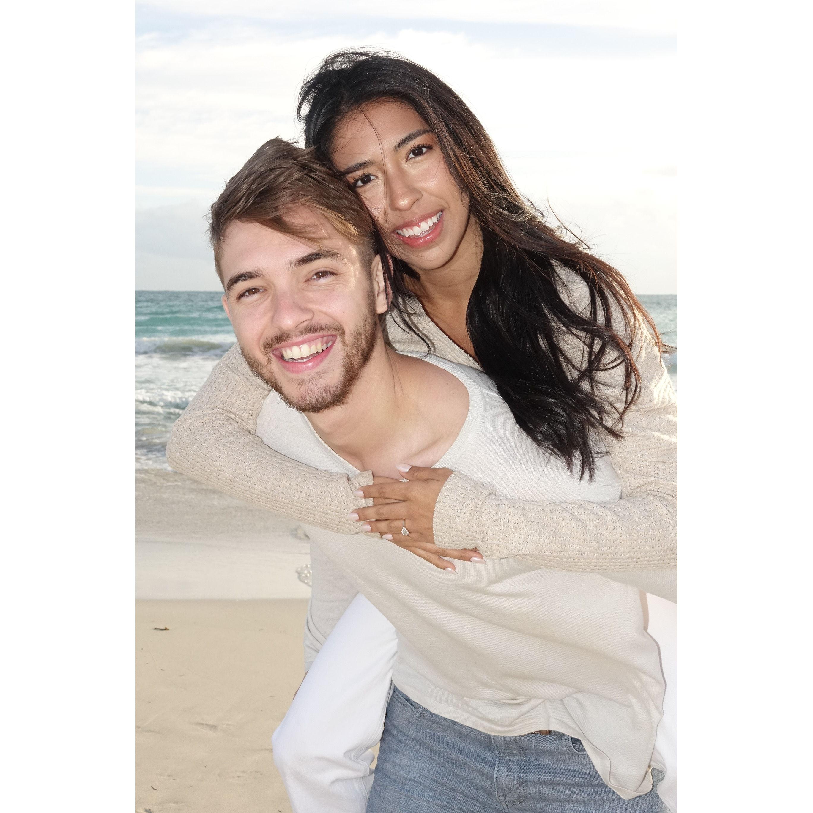 On January 20, Adam surprised Yuli in Miami. He proposed in the area where they have some of their fondest memories. Surrounded by some of their fave people, Yuli said yes.