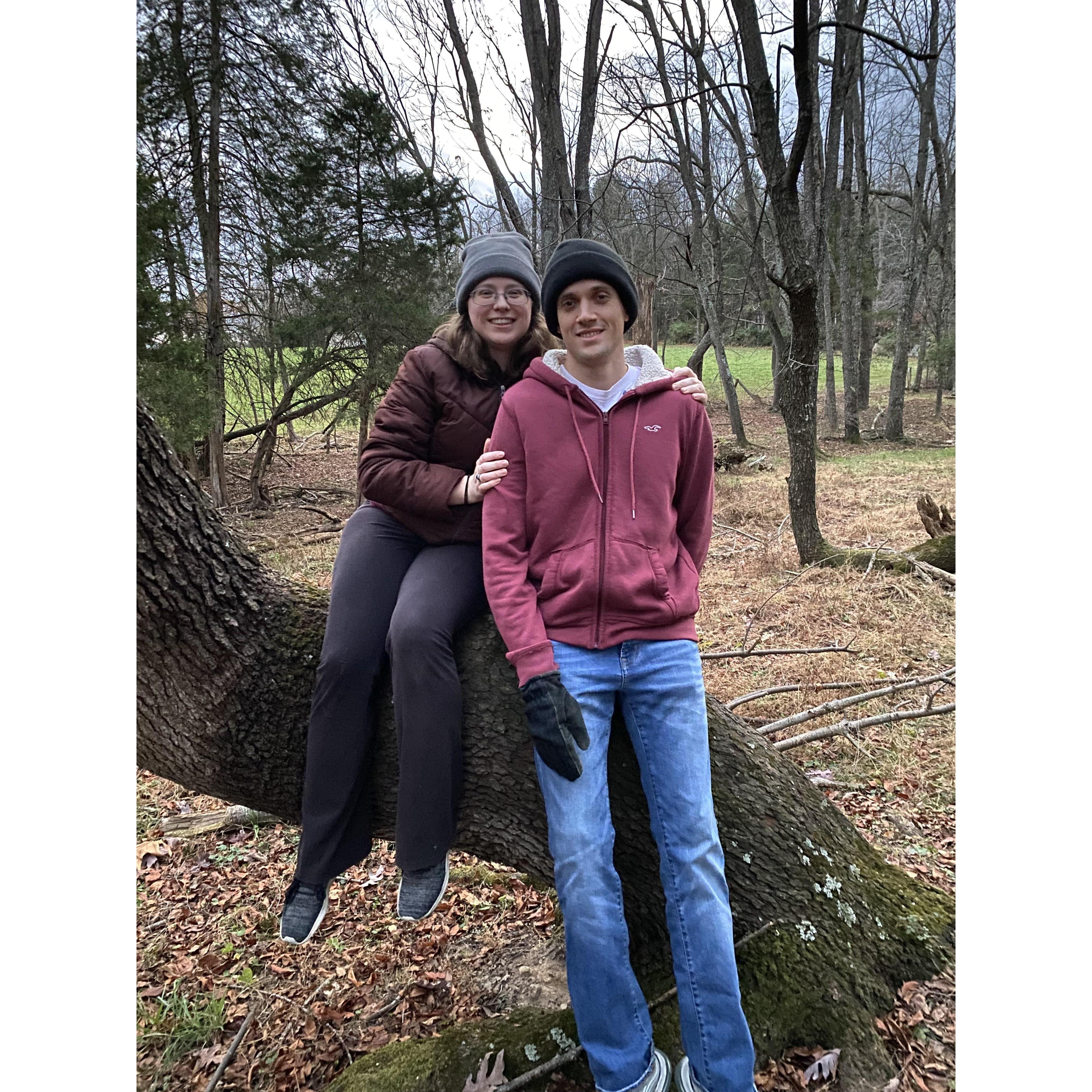 Us sitting in the woods of Jessie's family farm. We got to show Nathan's parents the farm.