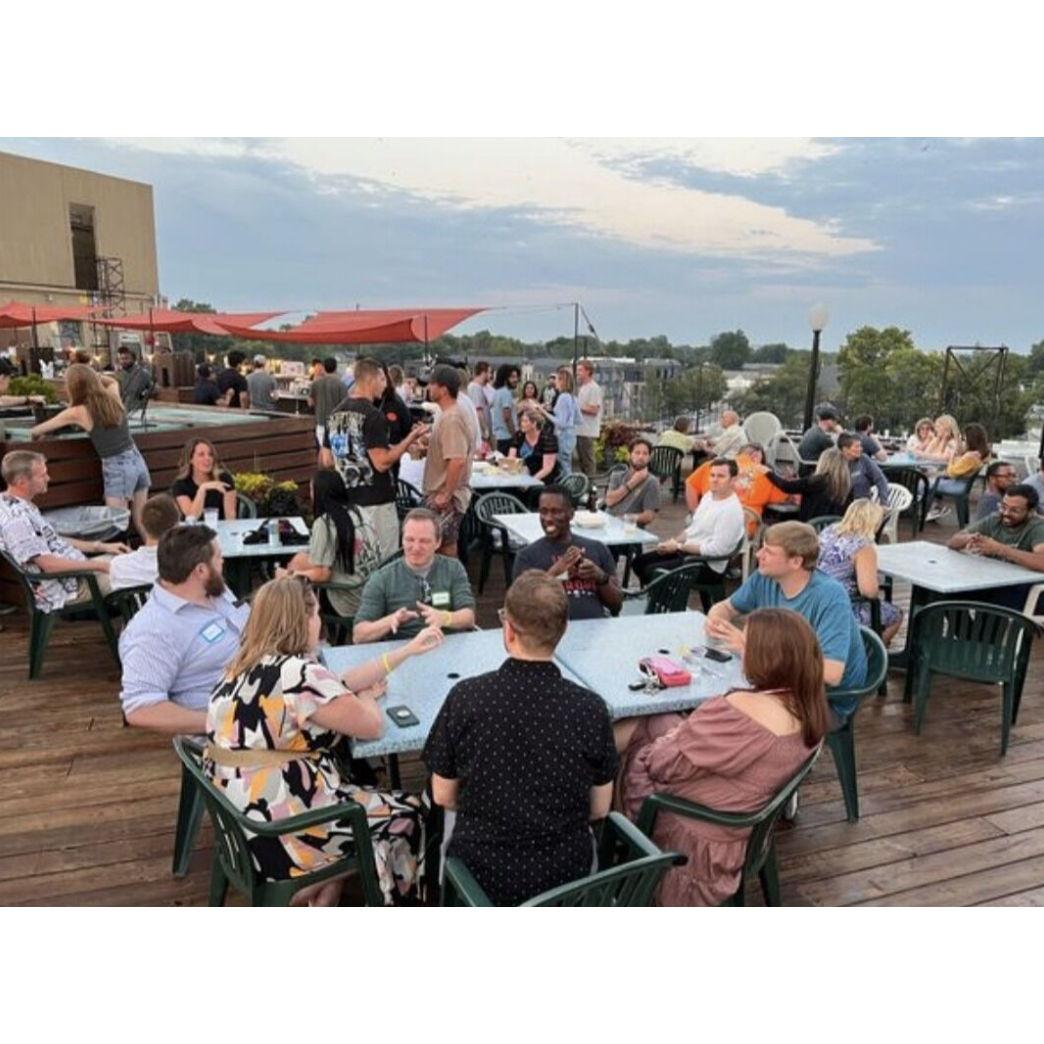 Jim and I met at an event at a rooftop bar in Fountain Square, Indiana. This photo was taken that day. Little did we know this moment started our love story.