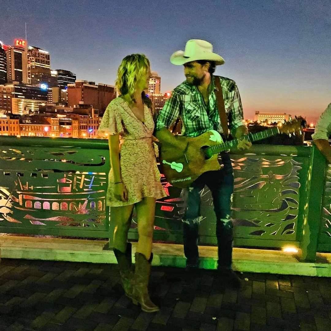 The moment right before he proposed, on the pedestrian bridge overlooking Nashville.