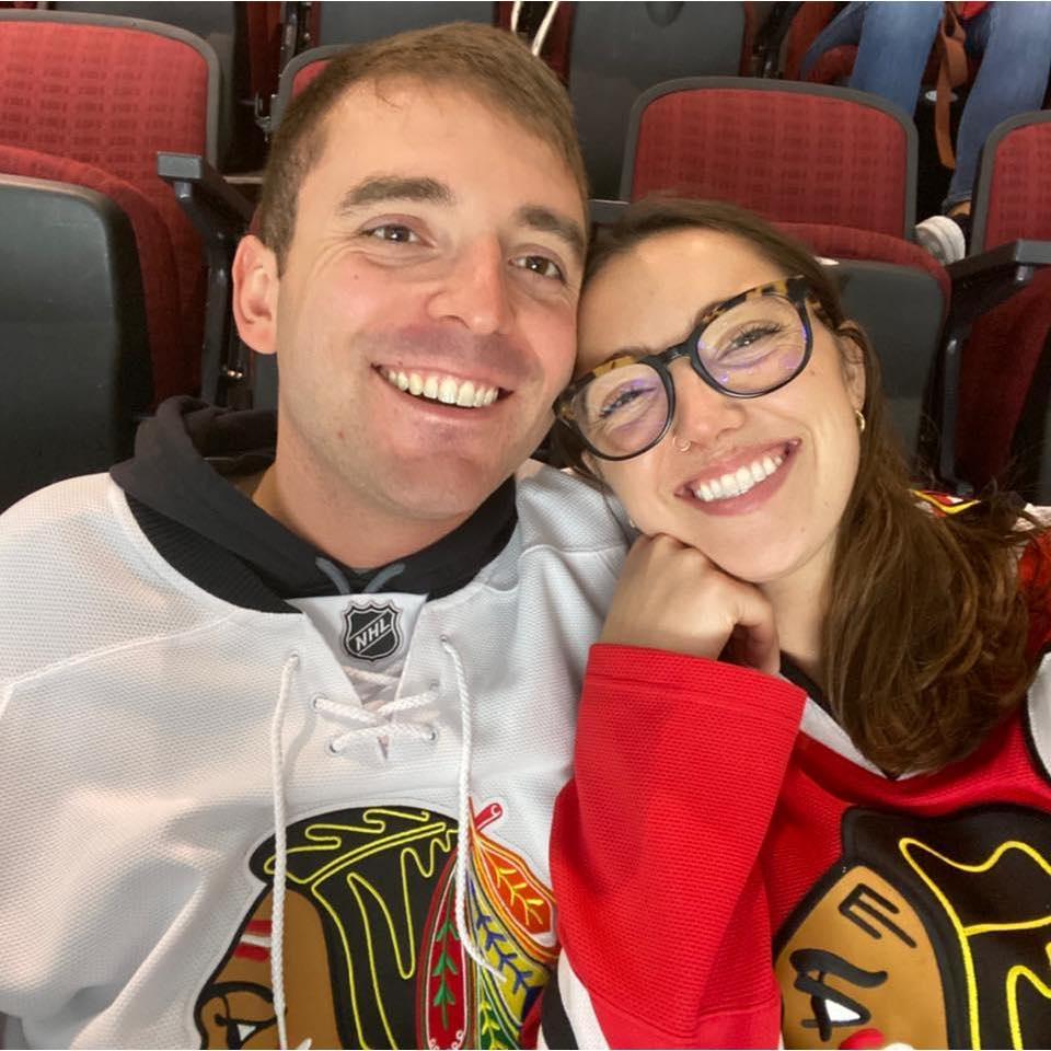 Aaron's first hockey game, when he visited Erin in Chicago for the first time after meeting.