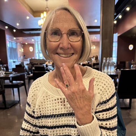 Showing off the beautiful ring. He got it so right!