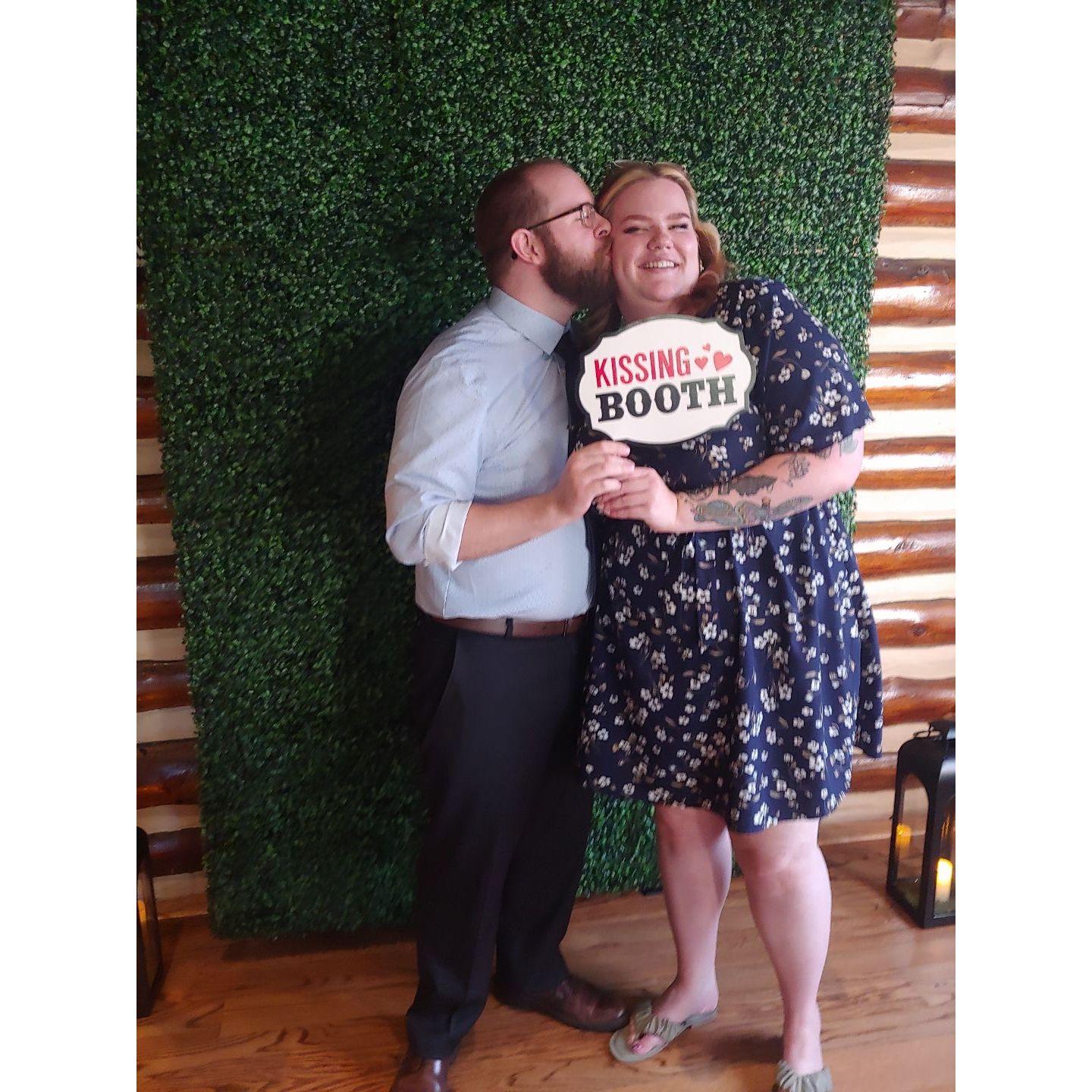 Taking pictures together at Ingrid & Robert's wedding.