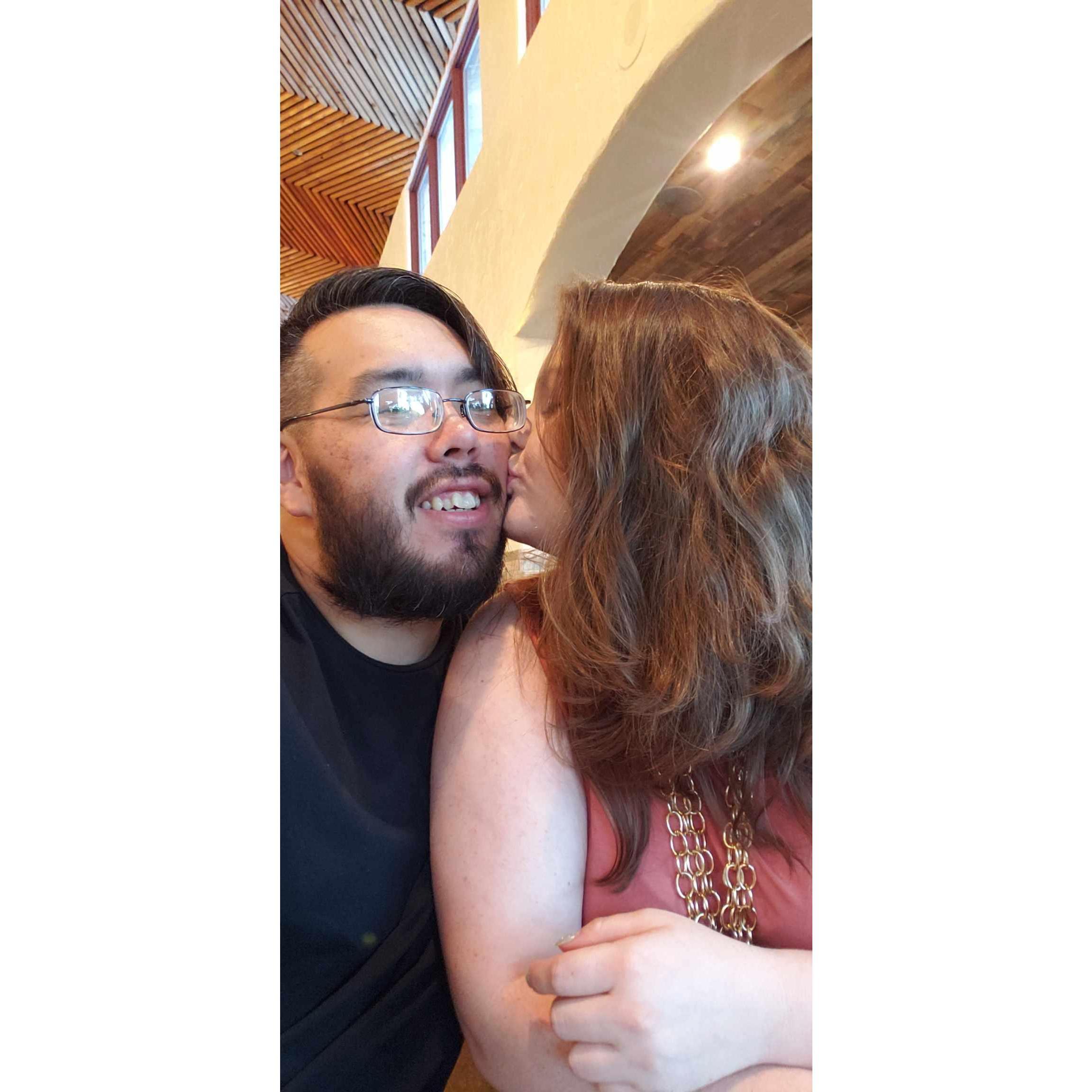 Sneaking a kiss in before my grandparents showed up for lunch.