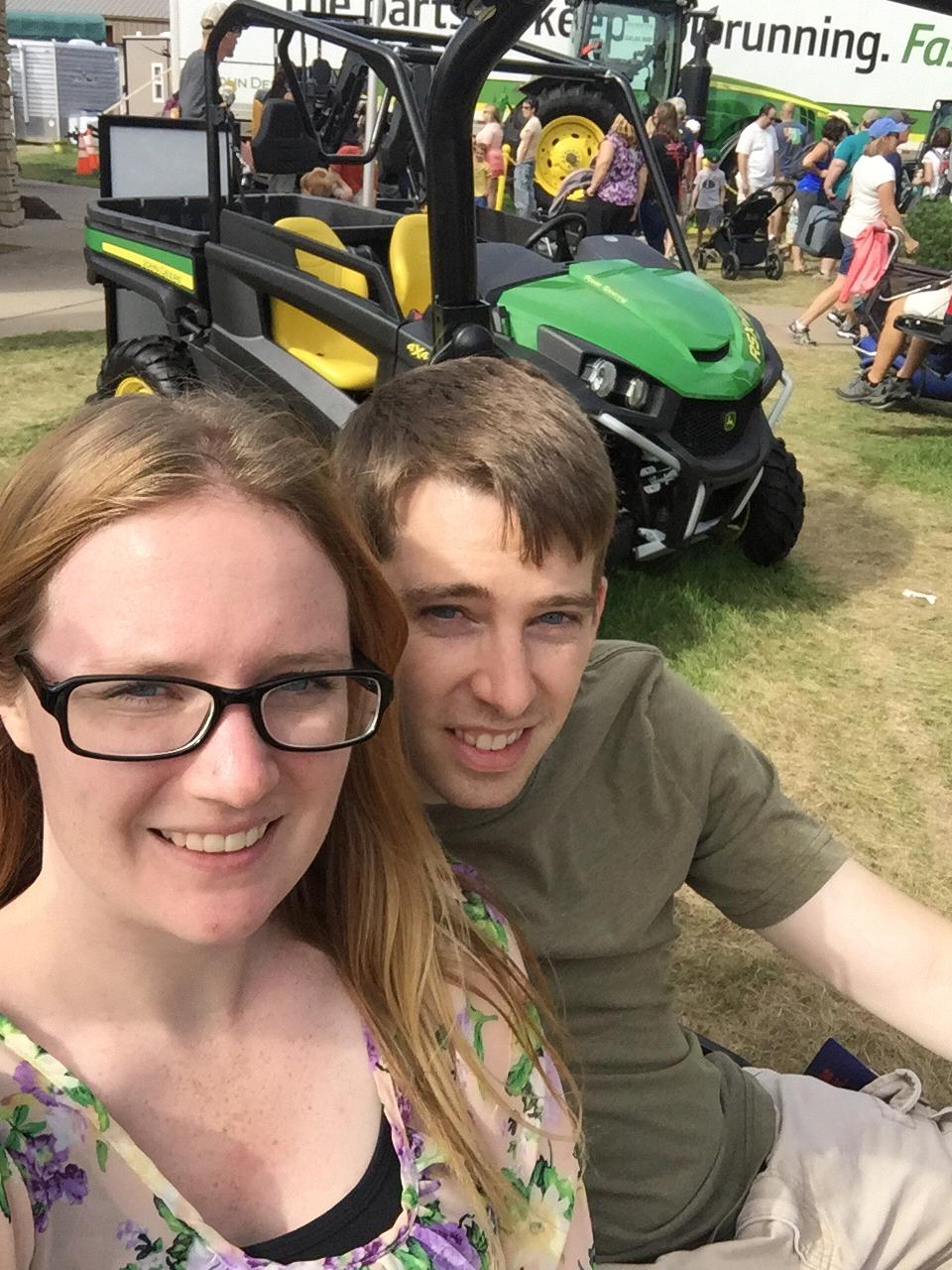 Checking out the John Deere booth at the Minnesota State Fair. We both work for John Deere and love the company!