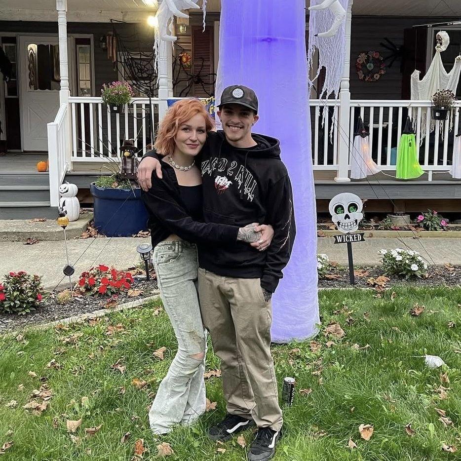 October 2021 - Our first photo together. 👻