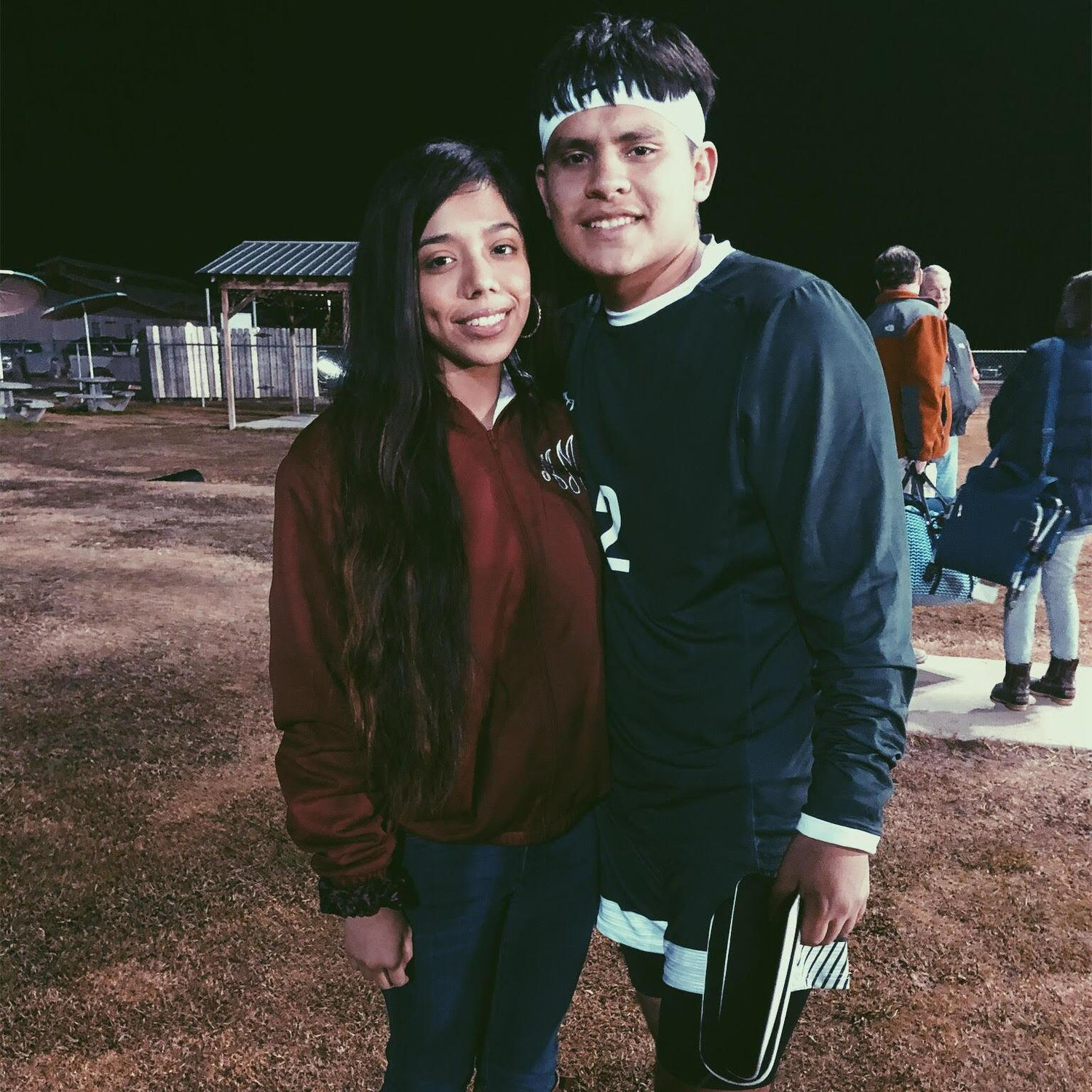 One of our first pictures together! We always supported each other at our high school events.