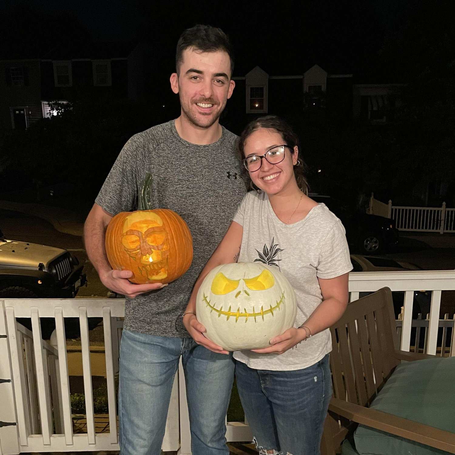 Conor and Ale carving pumpkins, Ale was super pumped about her Jack Skellington pumpkin that she carved without a stencil!