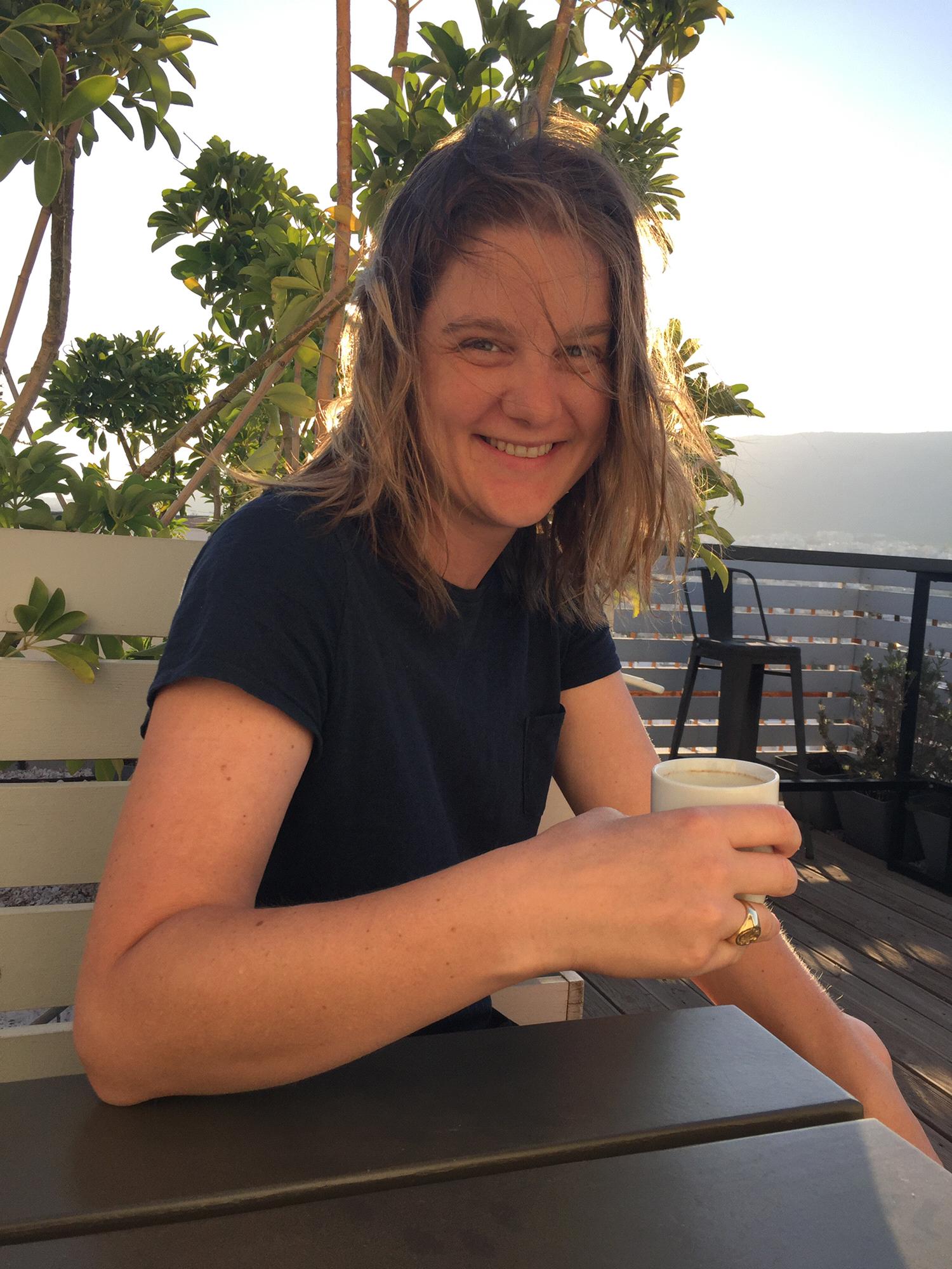 Morning coffee on Athens Airbnb rooftop terrace