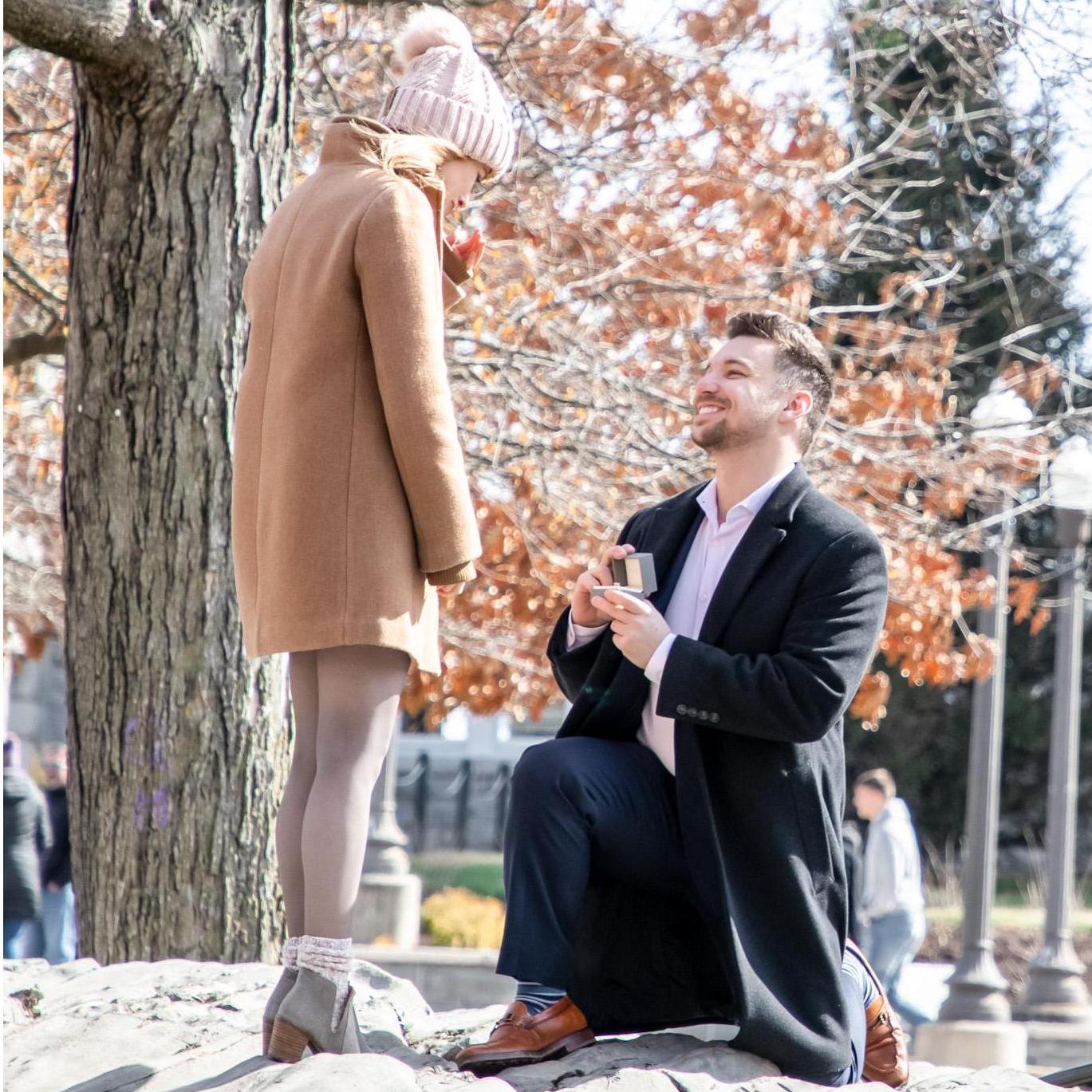 On the quad at JMU Lev said, "Hey there's that rock..." to which Brenna said, "That's the Kissing Rock!" and insisted they climb it. Little did she know she was playing right into Lev's hand...