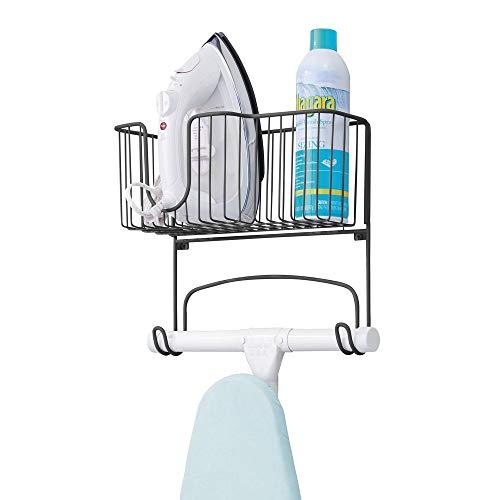 mDesign Metal Wall Mount Ironing Board Holder with Large Storage Basket - Holds Iron, Board, Spray Bottles, Starch, Fabric Refresher for Laundry Rooms - Matte Black