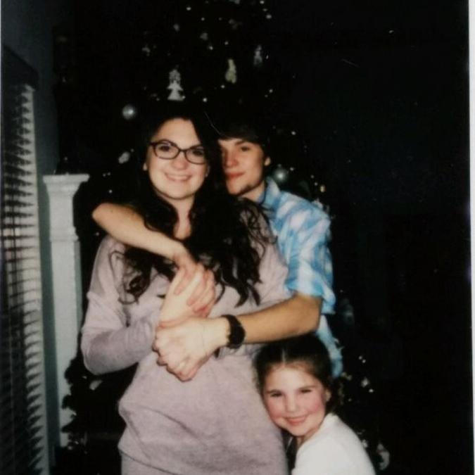 Christmas, 2018, with our lil photo-bomber (Kaelynn)!