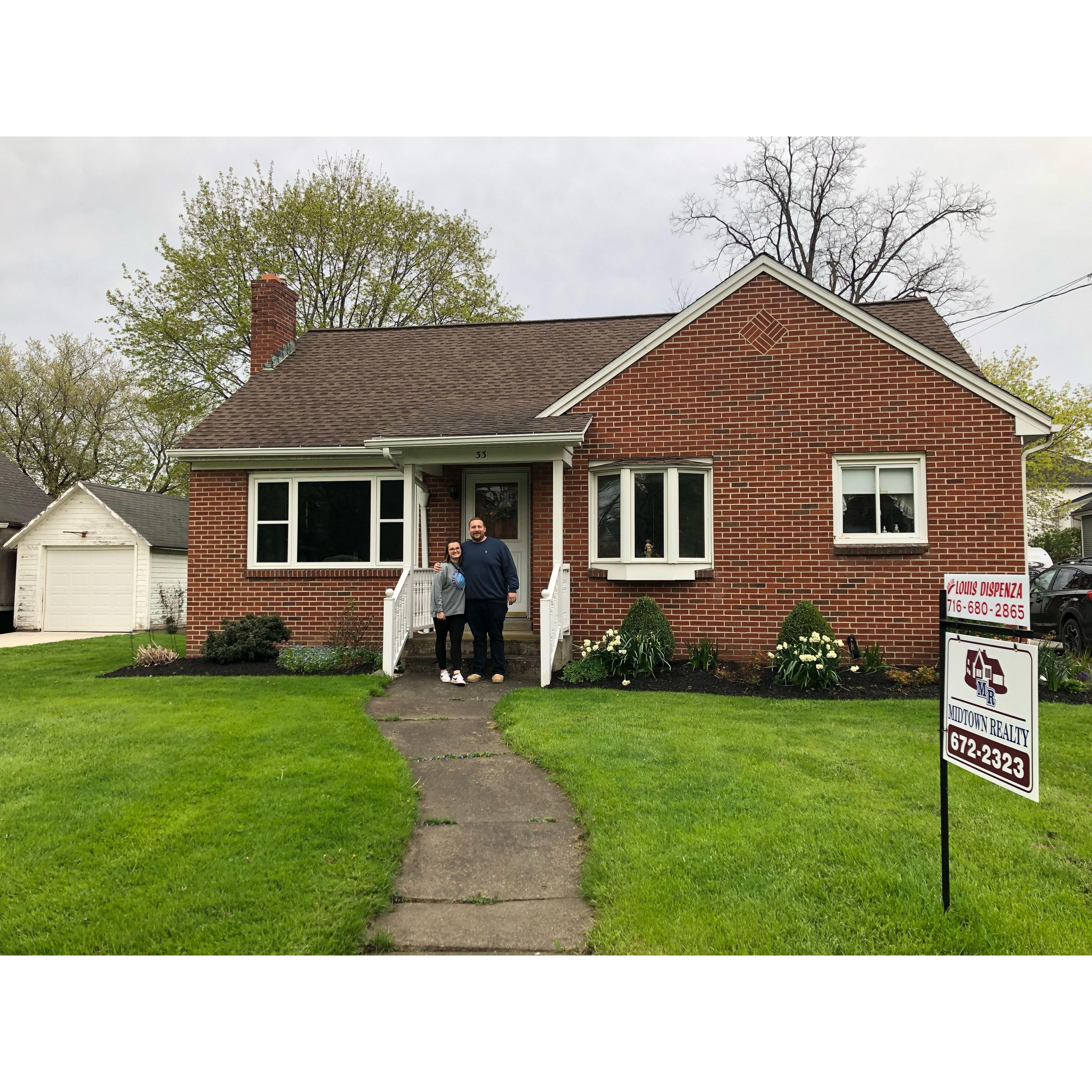 First picture we took after signing the paper of our fist home.