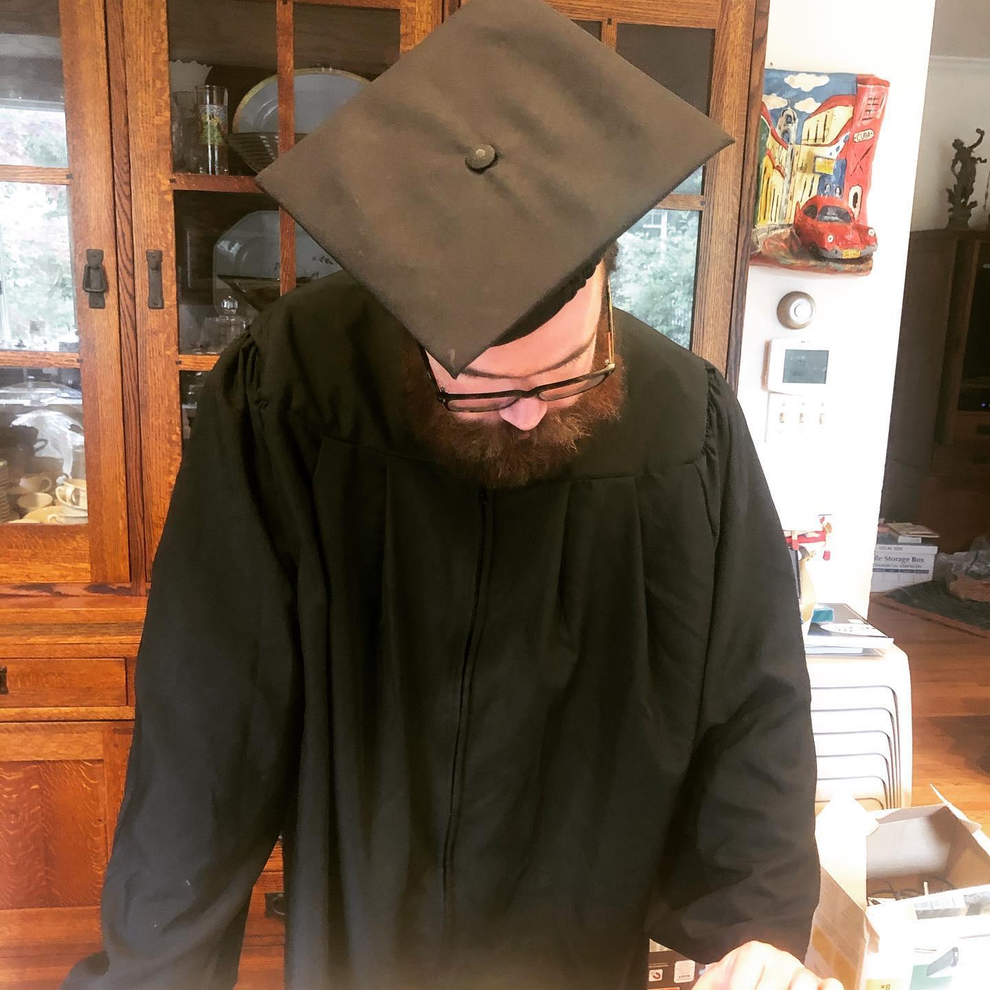 John Henry's graduation from Yale Divinity School ~ in his parents' kitchen in Baltimore, MD (May 2020)