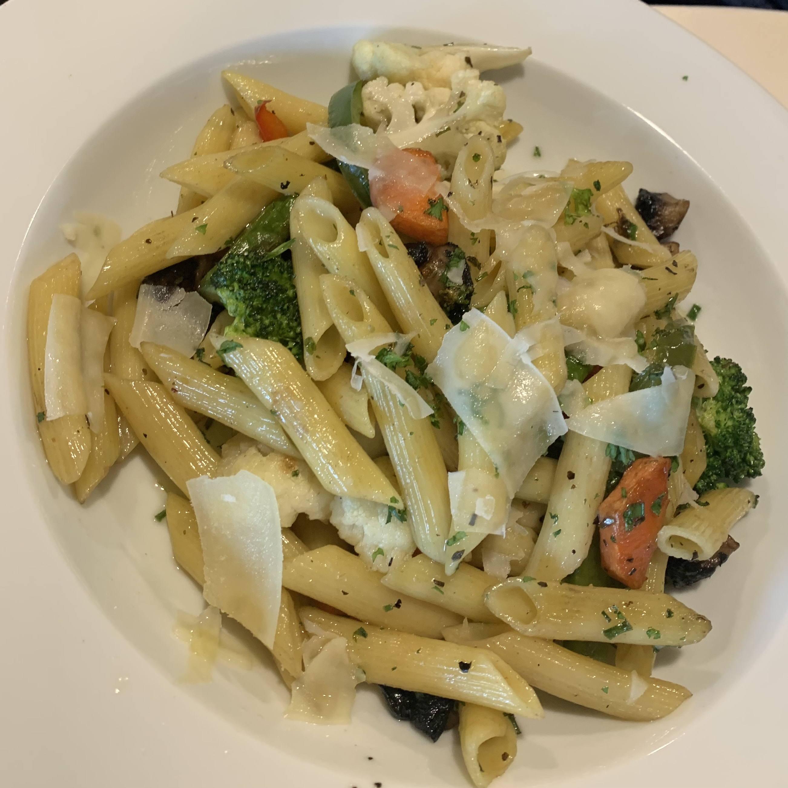 Pasta Primavera with Smoked Gouda:
Penne tossed with zucchini, tri-colored peppers, spinach, shiitake mushrooms, carrots, diced tomatoes, onions, garlic, herbs, parmigiano-reggiano and smoked gouda