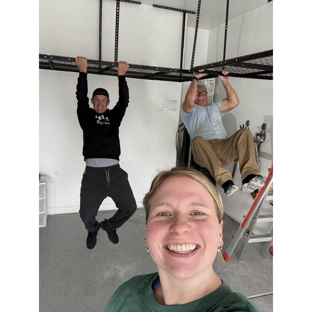Becca's dad helped us put up shelves in the garage