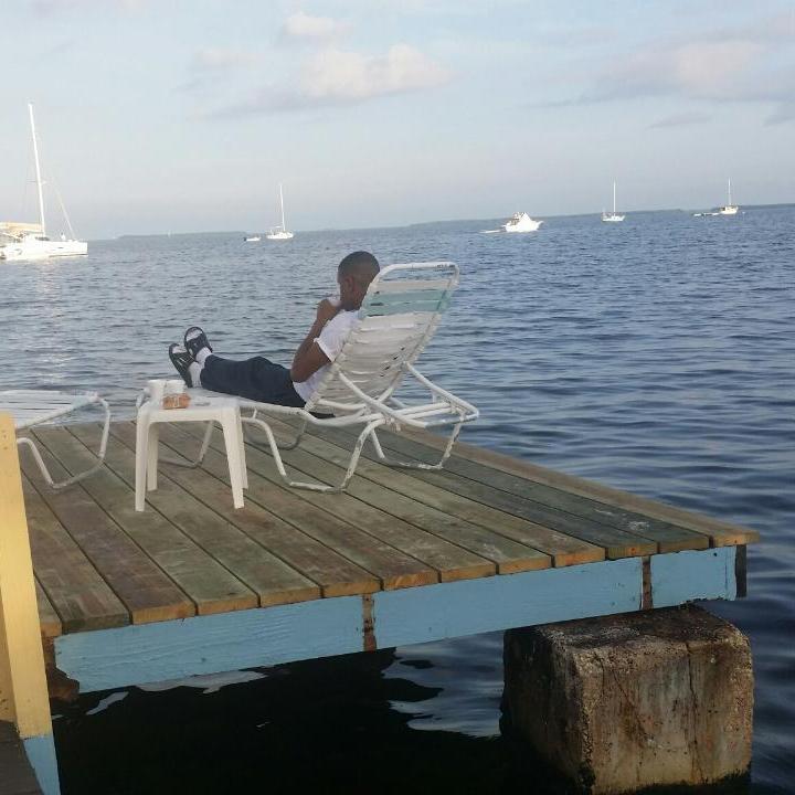 Reggie enjoying a cup of coffee in Islamorada, The Keys