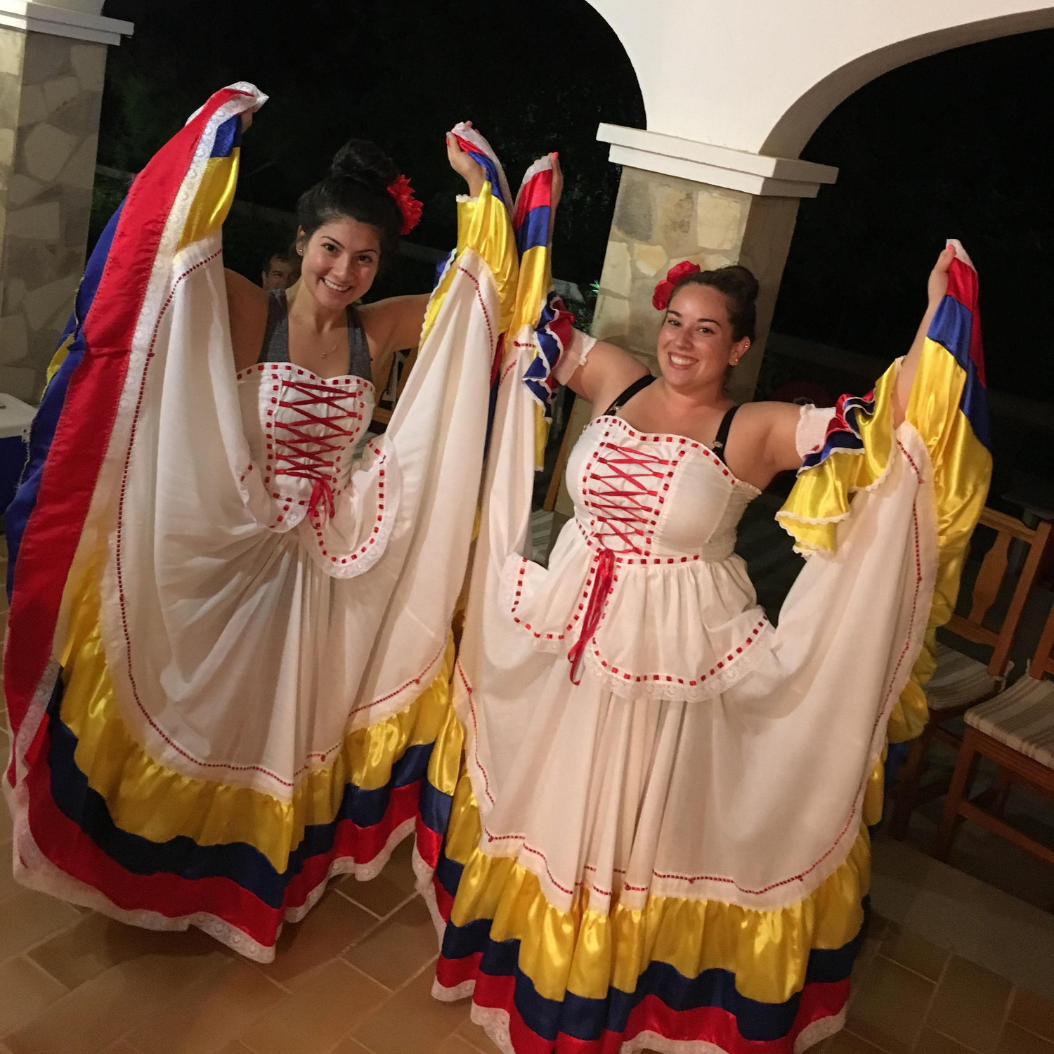 Tatiana and Emily learning traditional Colombian dances.