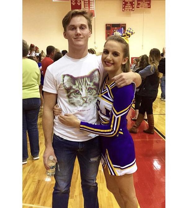 Jackson supporting Ashton at a cheerleading competition