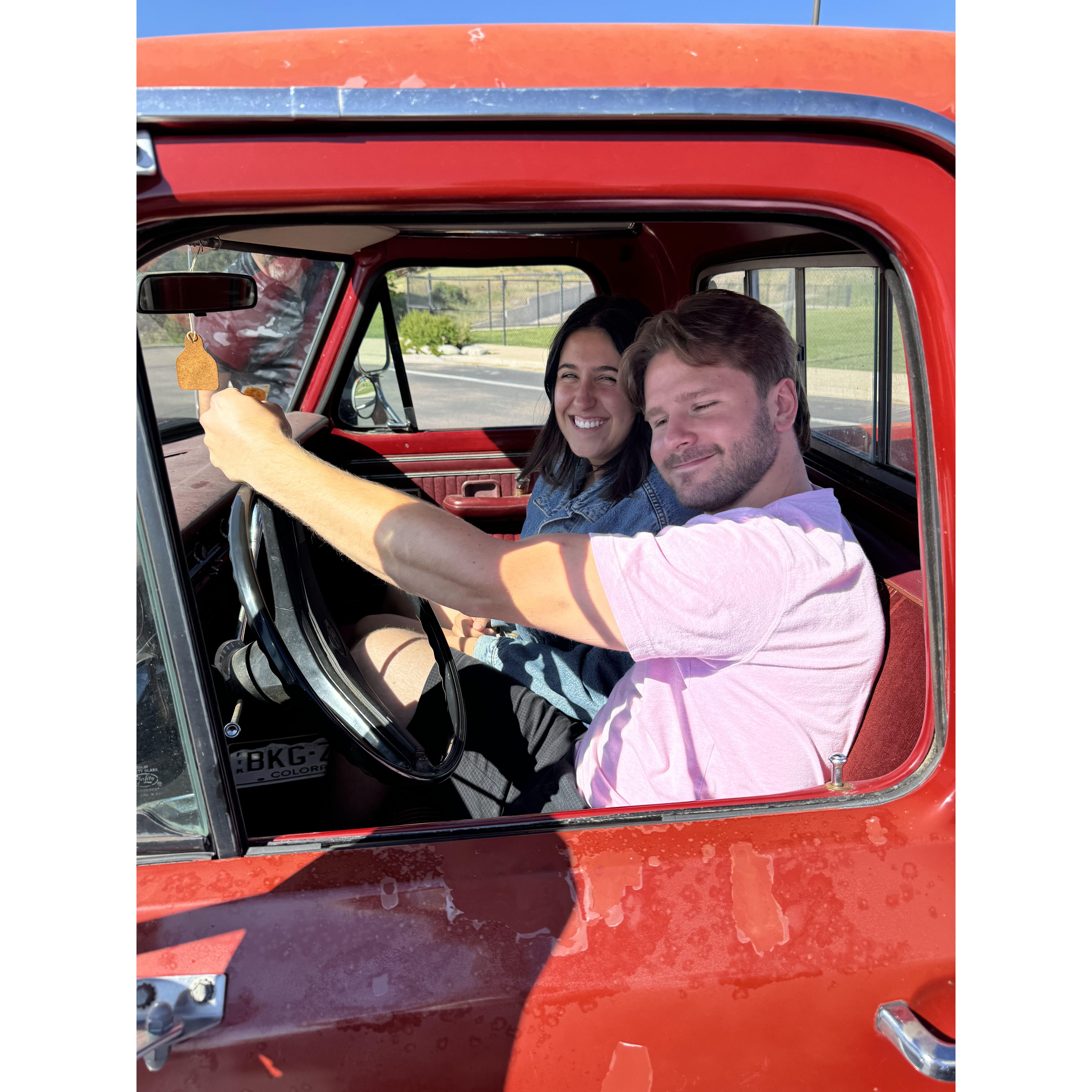 Something got into Tobie this day! The truck, the girl, and the muscles!