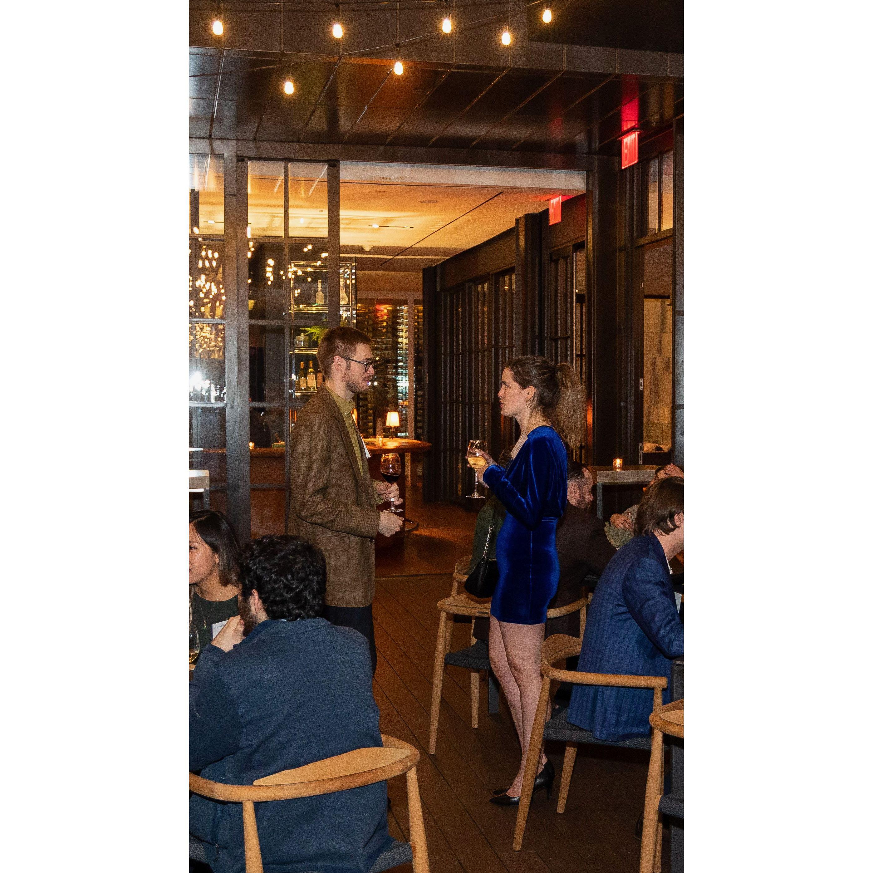 The start of our relationship -- we were catching up at a law school cocktail reception and the photographer caught this moment!