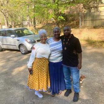 Officer Arel, his mother,and Elizabeth.