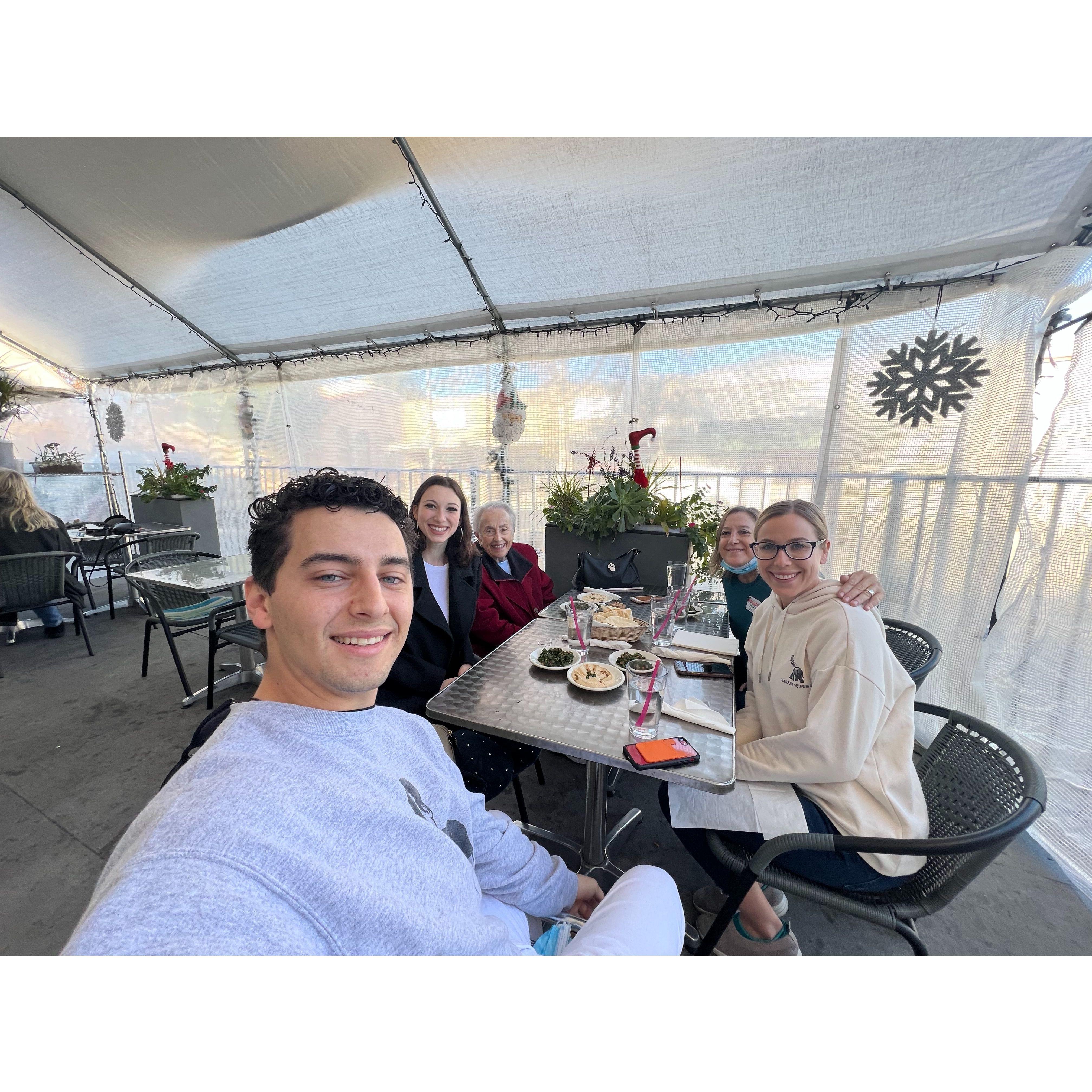 Enjoying some Mediterranean food with Grammy, Aunt Carrie, and Amy